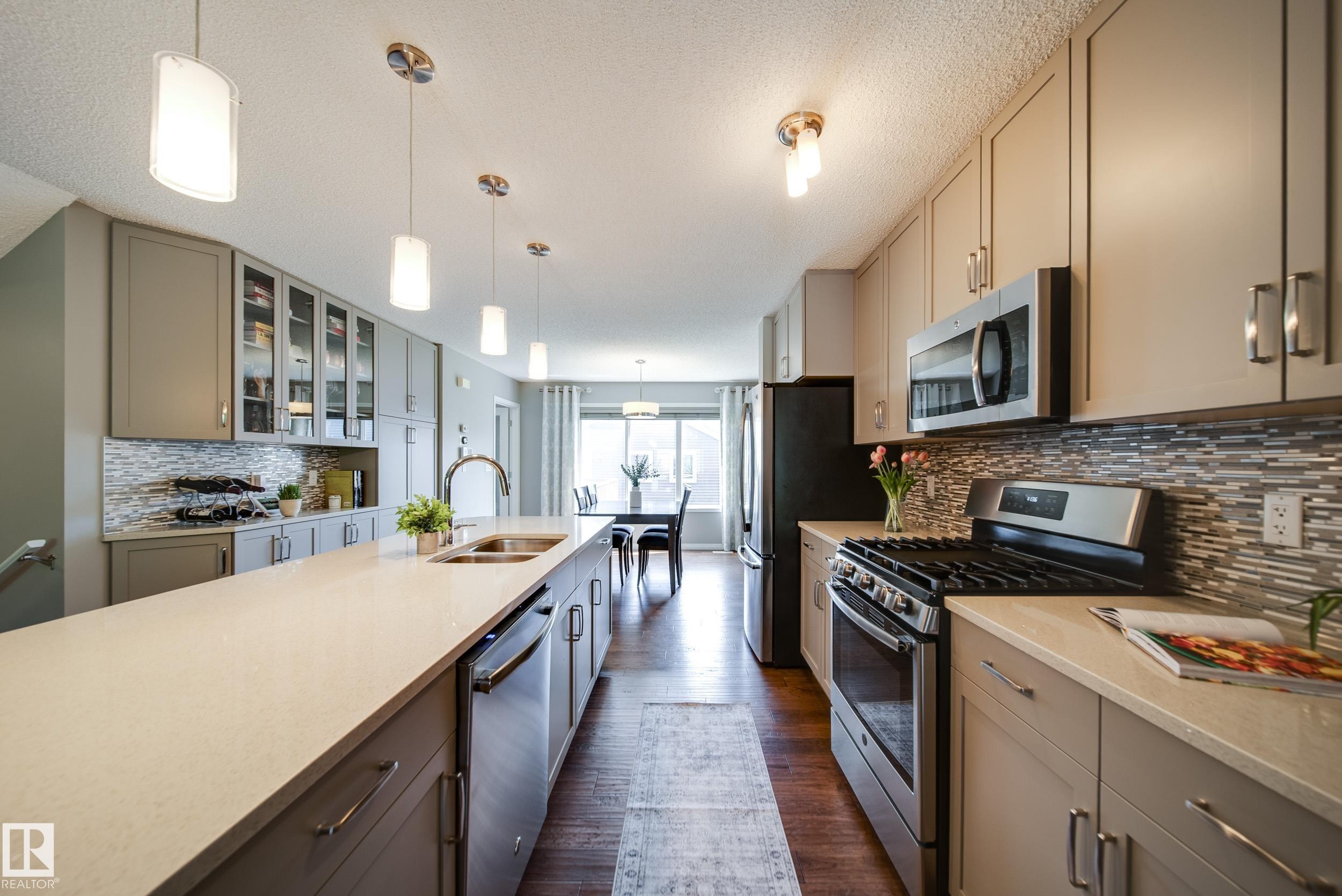 3365 Orchards Link, Edmonton, AB - Indoor Photo Showing Kitchen With Stainless Steel Kitchen With Double Sink With Upgraded Kitchen