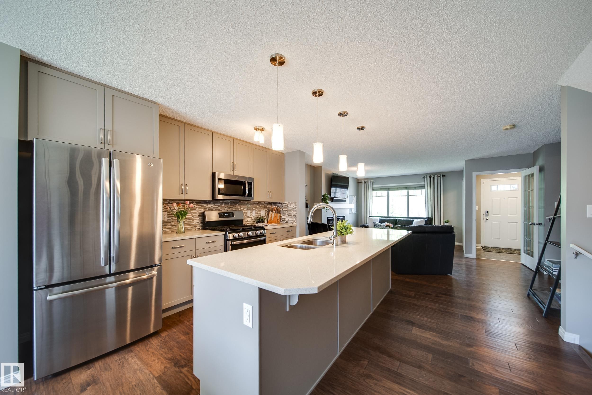 3365 Orchards Link, Edmonton, AB - Indoor Photo Showing Kitchen With Stainless Steel Kitchen With Double Sink With Upgraded Kitchen