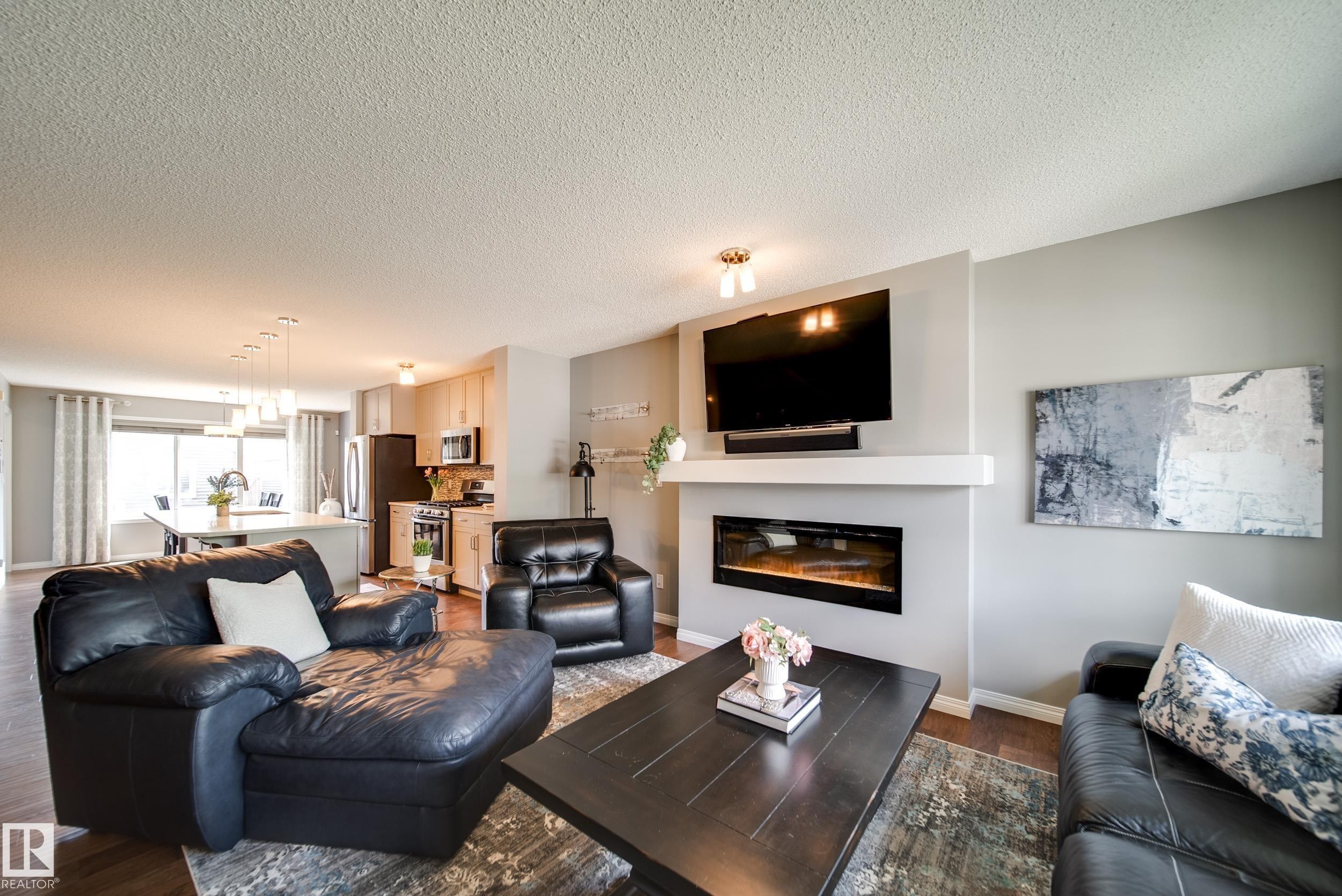3365 Orchards Link, Edmonton, AB - Indoor Photo Showing Living Room With Fireplace