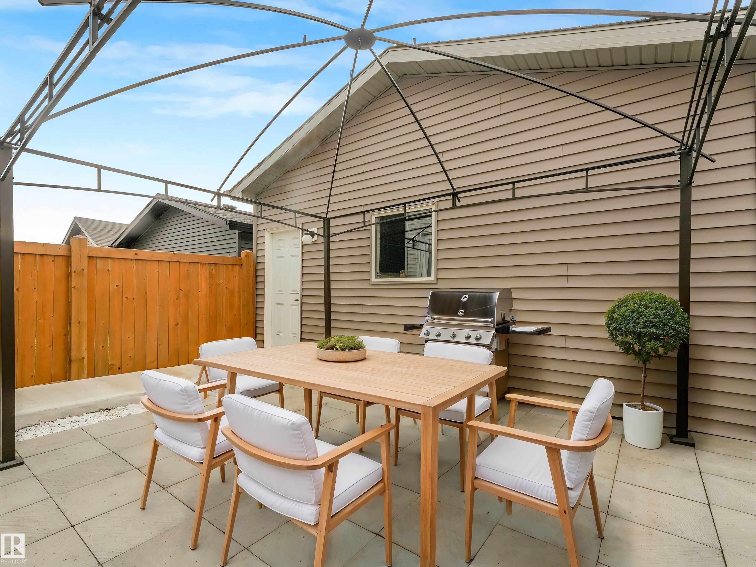 Virtually Staged - 19310 26A Ave, Edmonton, AB - Outdoor With Deck Patio Veranda With Exterior