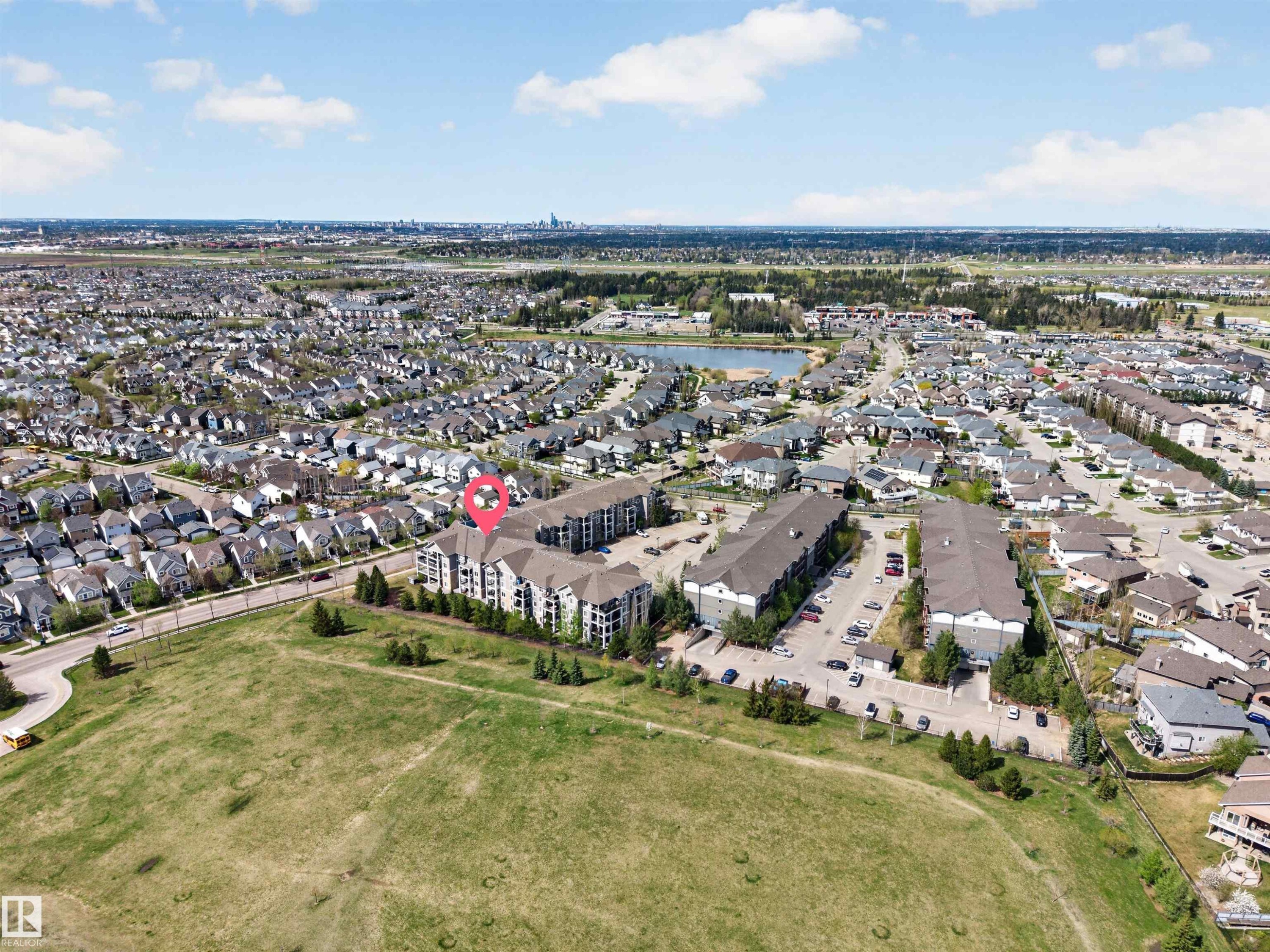 Aerial perspective showcasing a residential community with varied architectural styles - 215 6084 Stanton Drive, Edmonton, AB - Outdoor With View