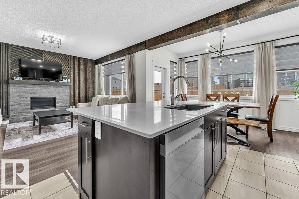 2107 14 Avenue, Edmonton, AB - Indoor Photo Showing Kitchen With Fireplace With Upgraded Kitchen