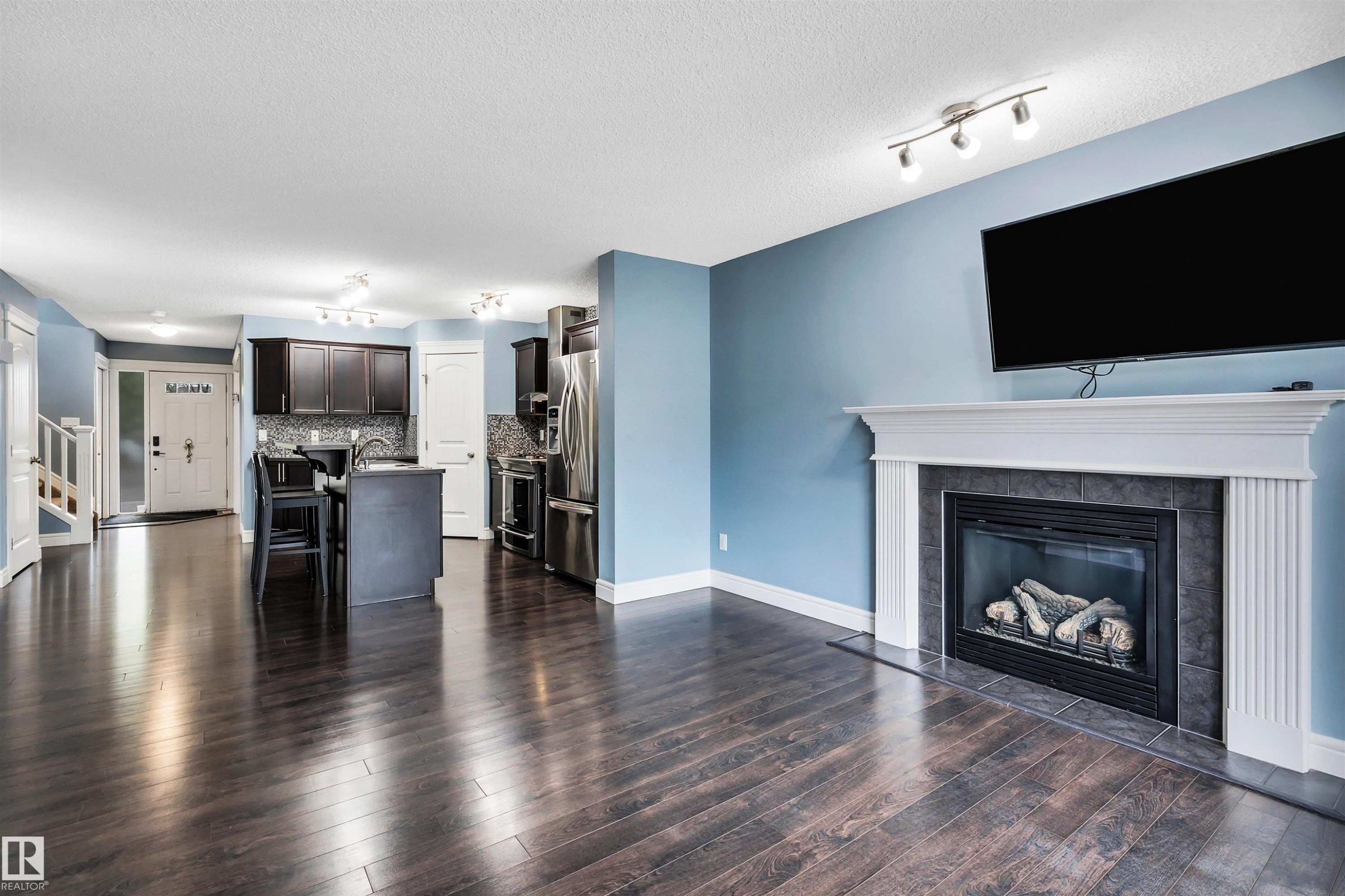2429 Austin Crescent, Edmonton, AB - Indoor Photo Showing Living Room With Fireplace