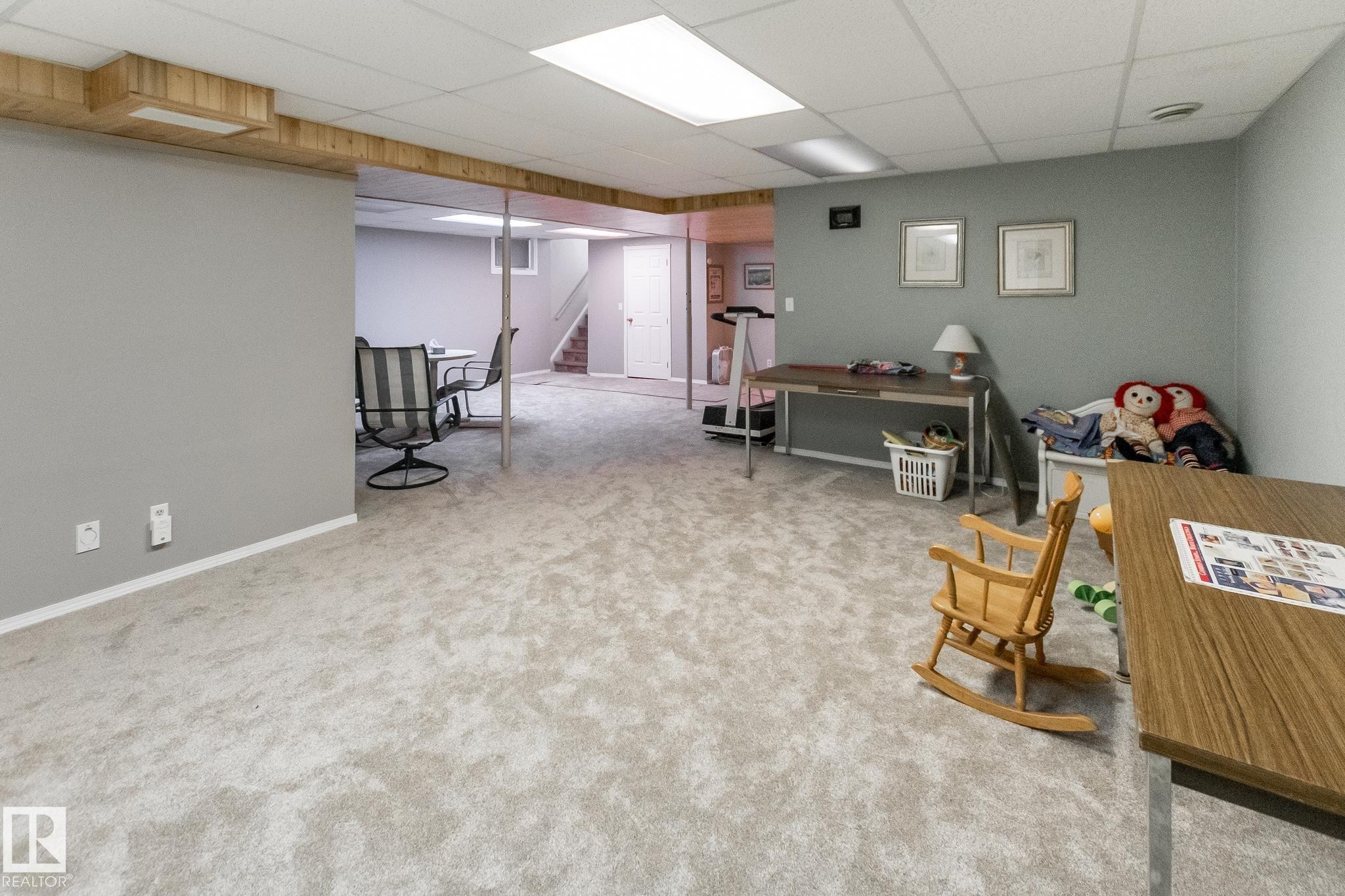 Spacious lower level featuring light gray carpeting and recessed lighting - 4611 Lakeshore Drive, Bonnyville Town, AB - Indoor Photo Showing Basement