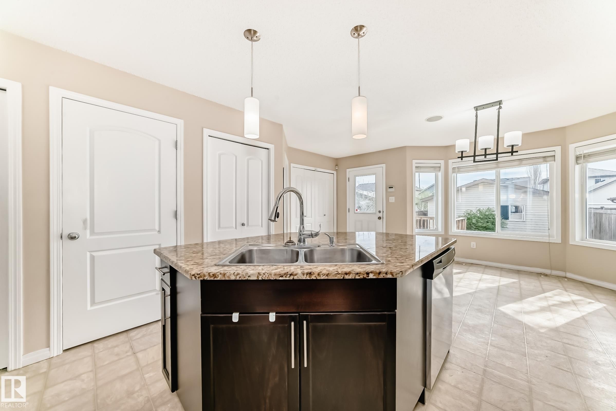 7706 Schmid Crescent, Edmonton, AB - Indoor Photo Showing Kitchen With Double Sink