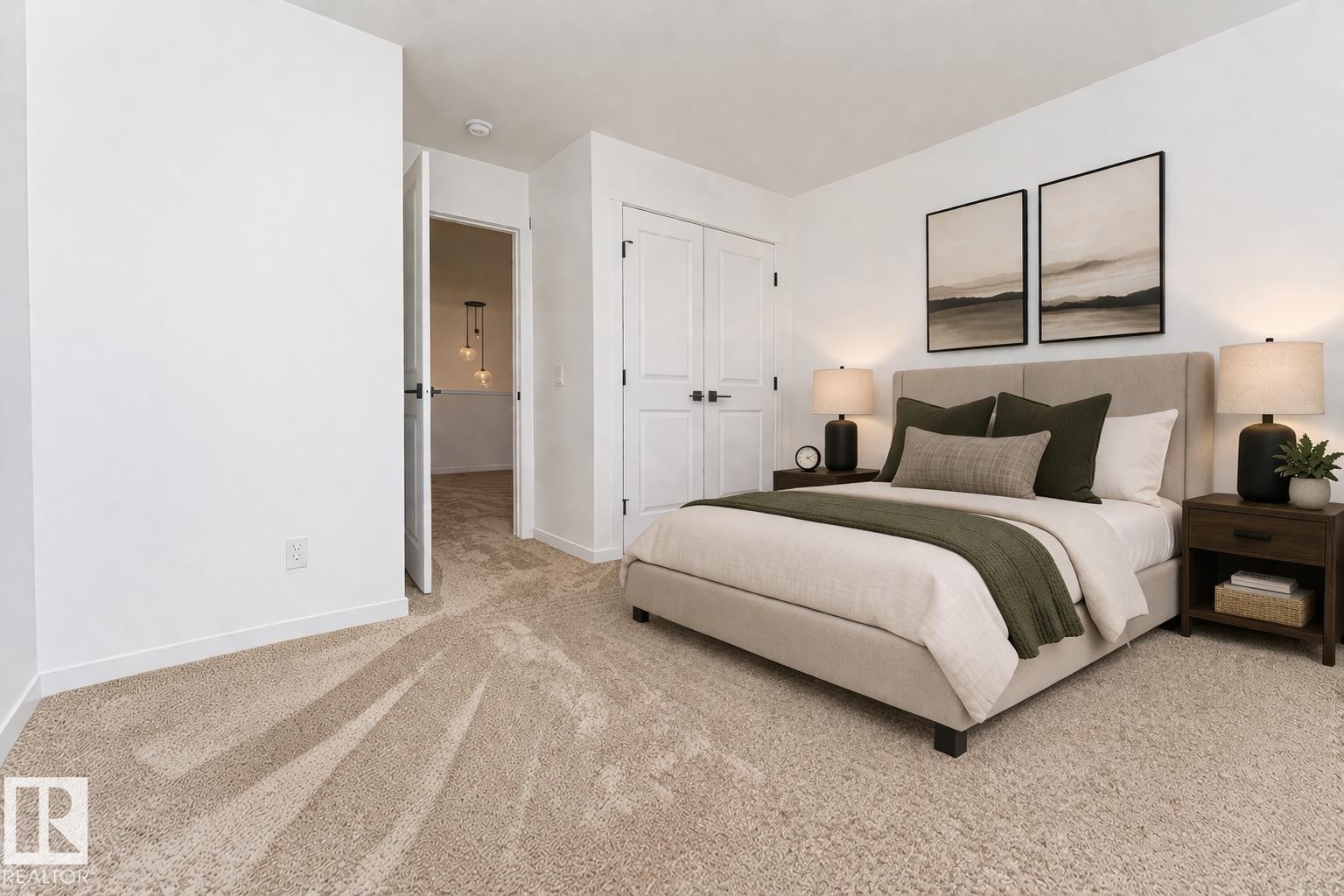 The property features a bright room with light-colored carpeting and white walls - 2355 Egret Way, Edmonton, AB - Indoor Photo Showing Bedroom