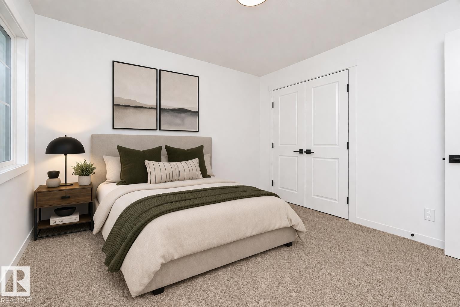 This bedroom features light-colored carpeting, white walls, and a window providing natural illumination - 2355 Egret Way, Edmonton, AB - Indoor Photo Showing Bedroom