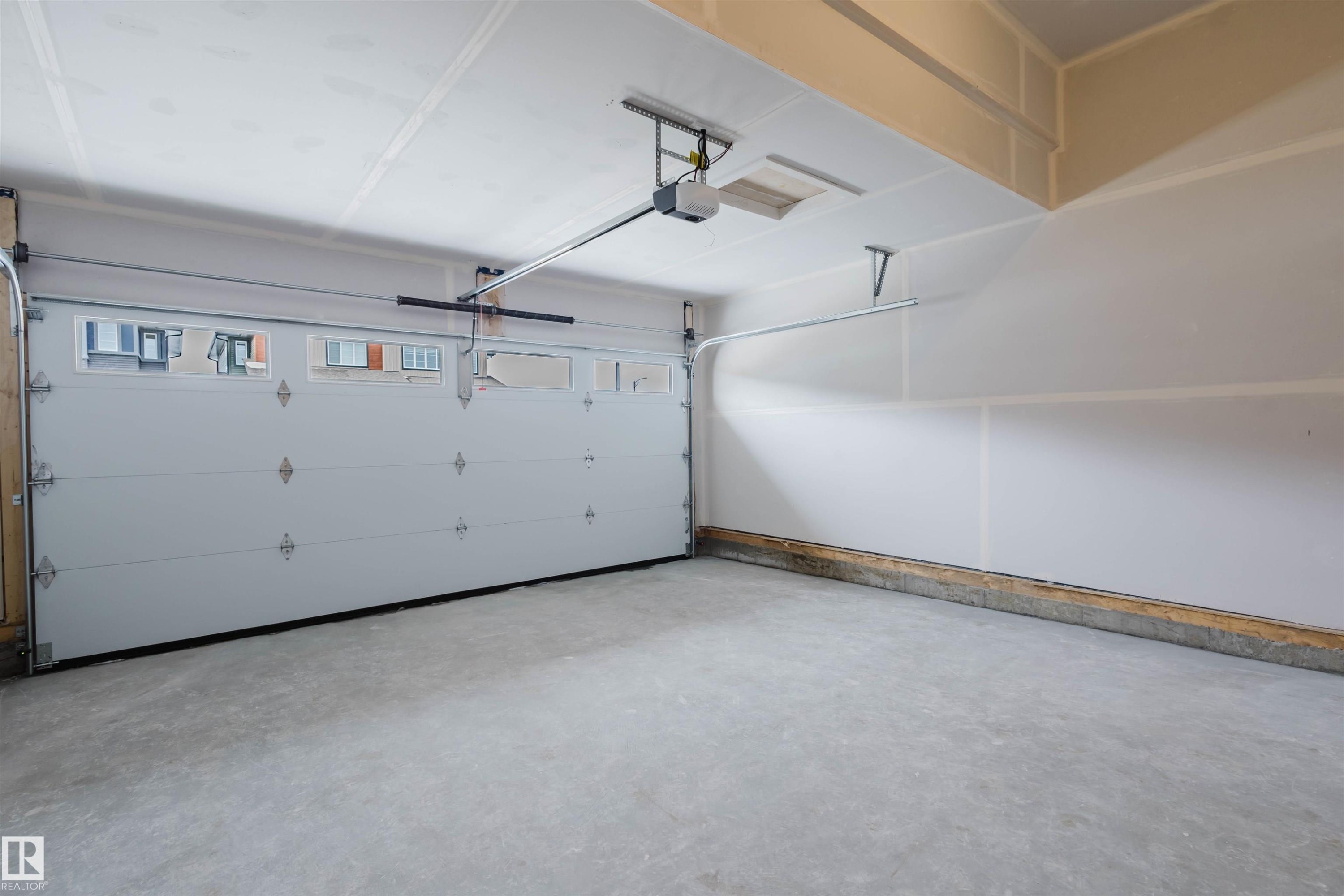 8243 Kiriak Loop Sw, Edmonton, AB - Indoor Photo Showing Garage