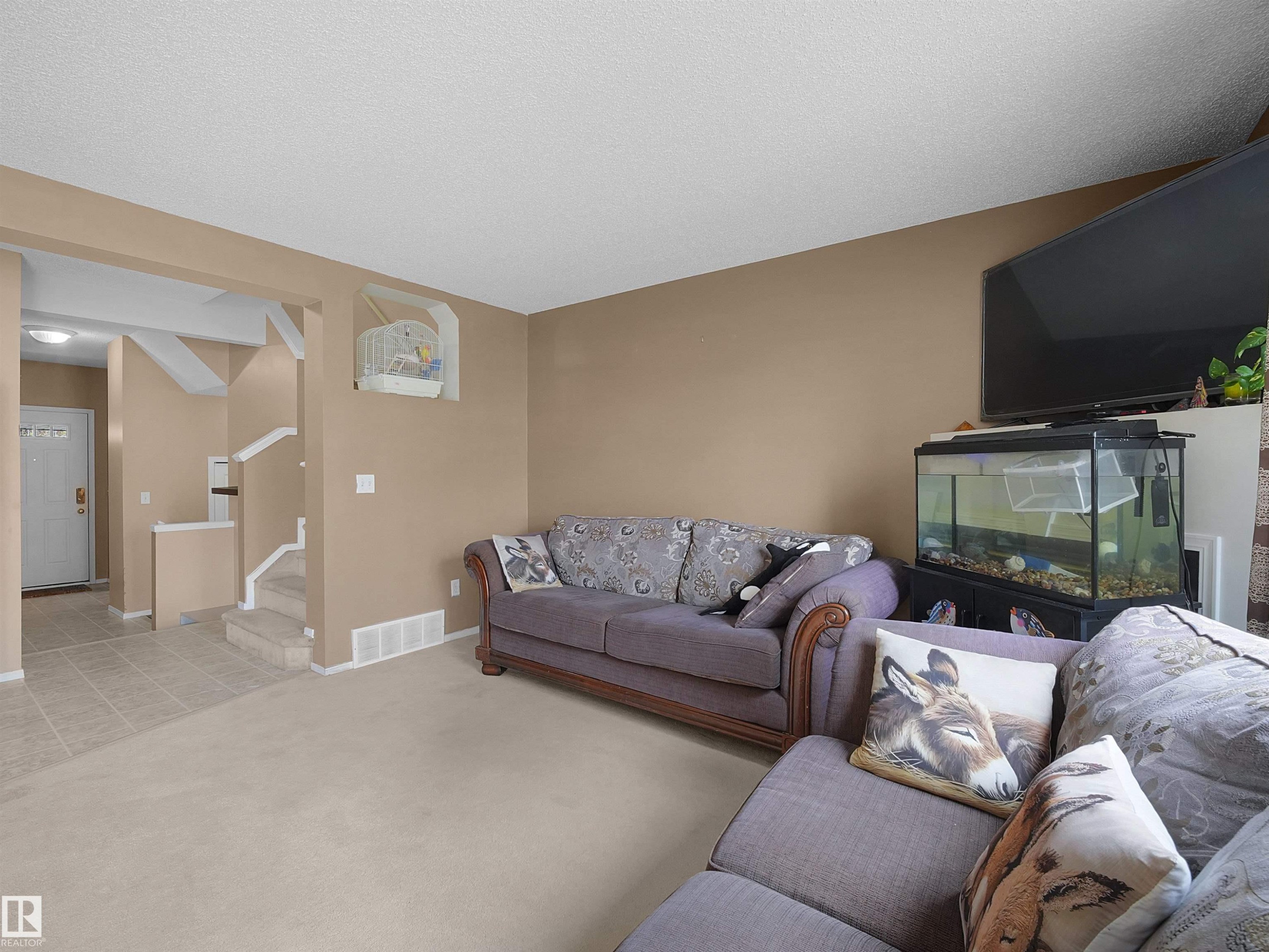 Carpeted living area with neutral wall tones - 16121 131A Street, Edmonton, AB - Indoor