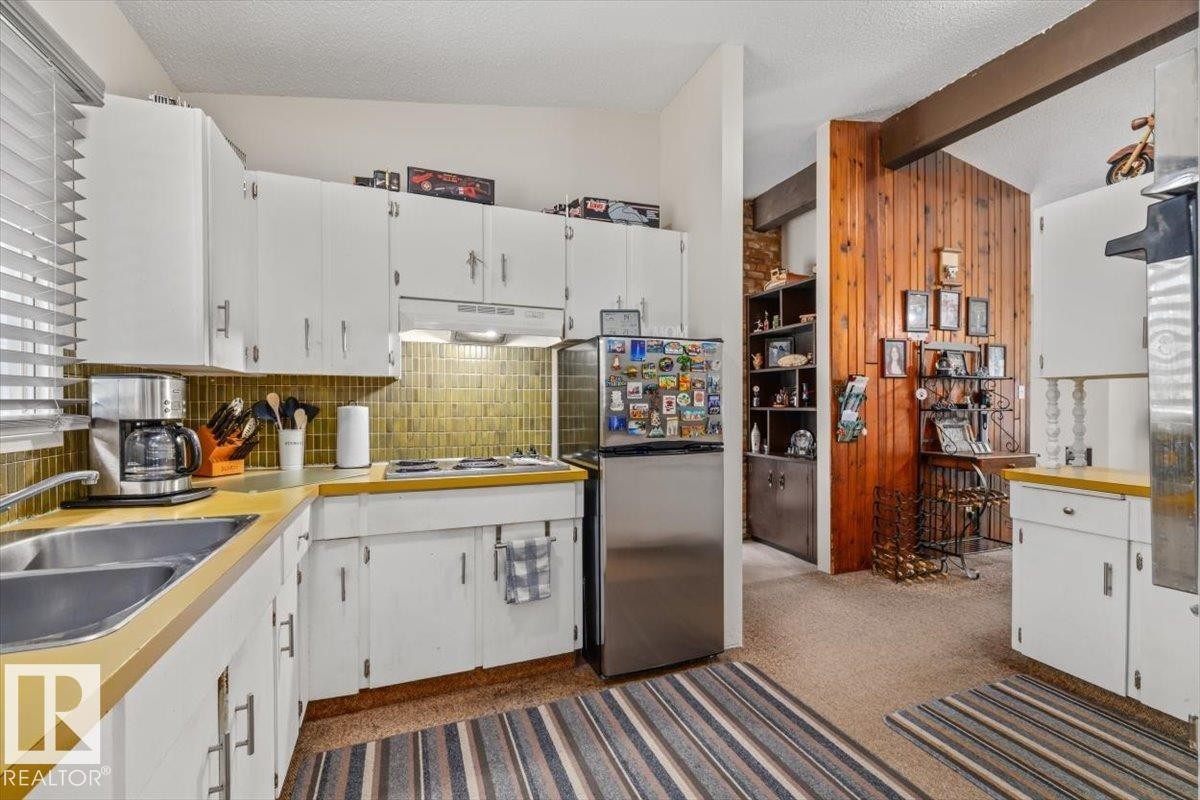 4411 209 Street Nw, Edmonton, AB - Indoor Photo Showing Kitchen With Double Sink