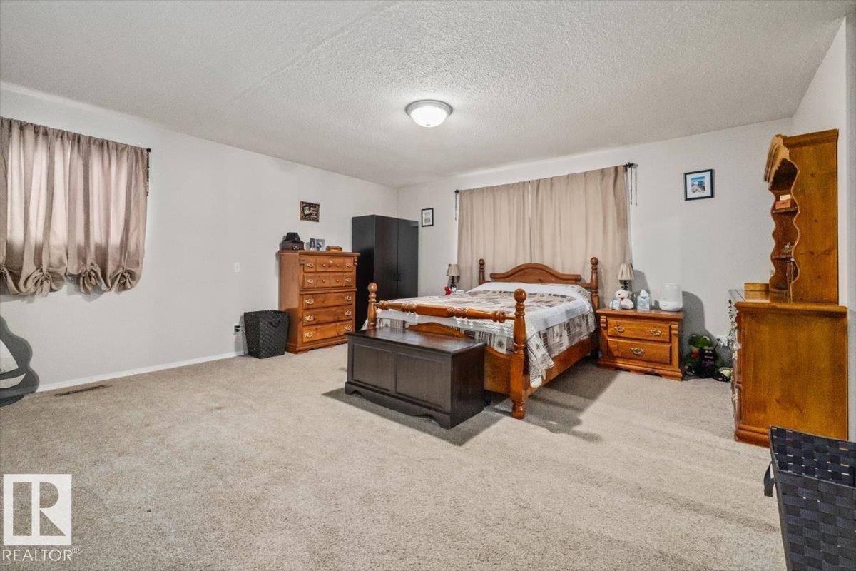 4411 209 Street Nw, Edmonton, AB - Indoor Photo Showing Bedroom