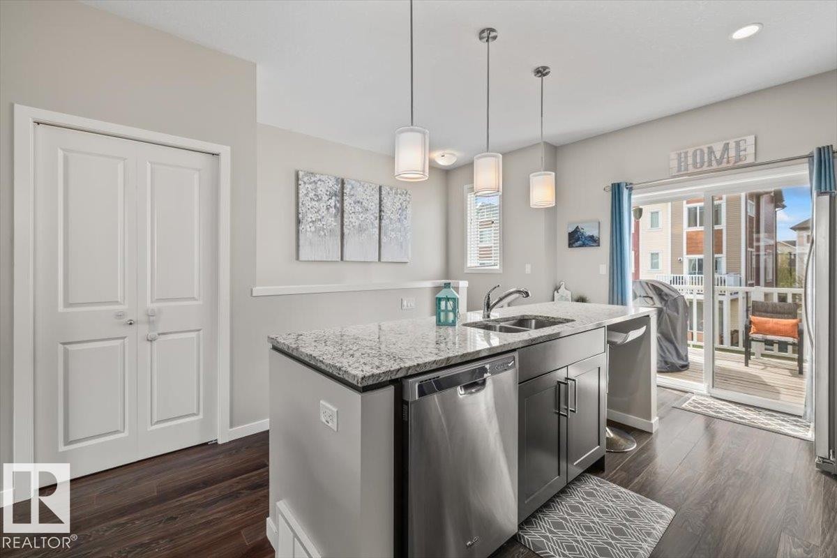 88 320 Secord Blvd, Edmonton, AB - Indoor Photo Showing Kitchen With Double Sink