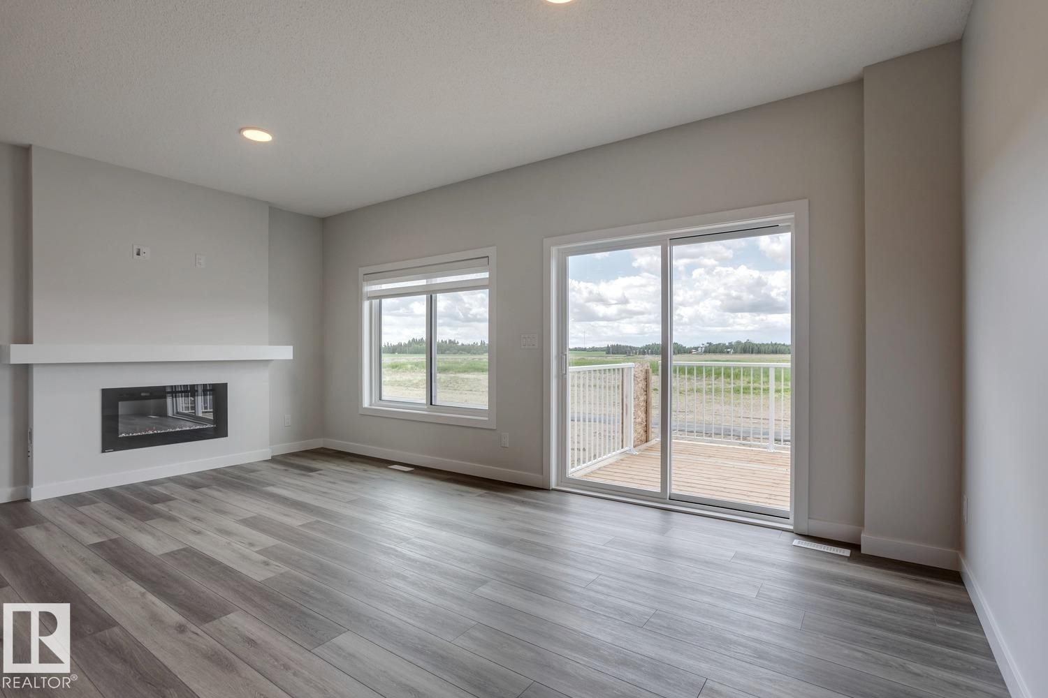 308 Brae Way, Leduc, AB - Indoor Photo Showing Living Room With Fireplace