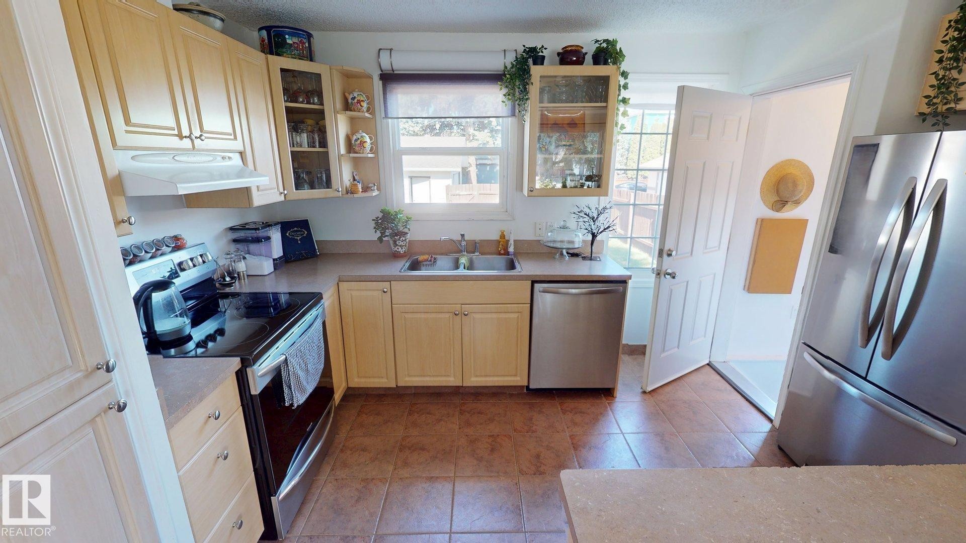 9650 86 Street, Edmonton, AB - Indoor Photo Showing Kitchen With Double Sink