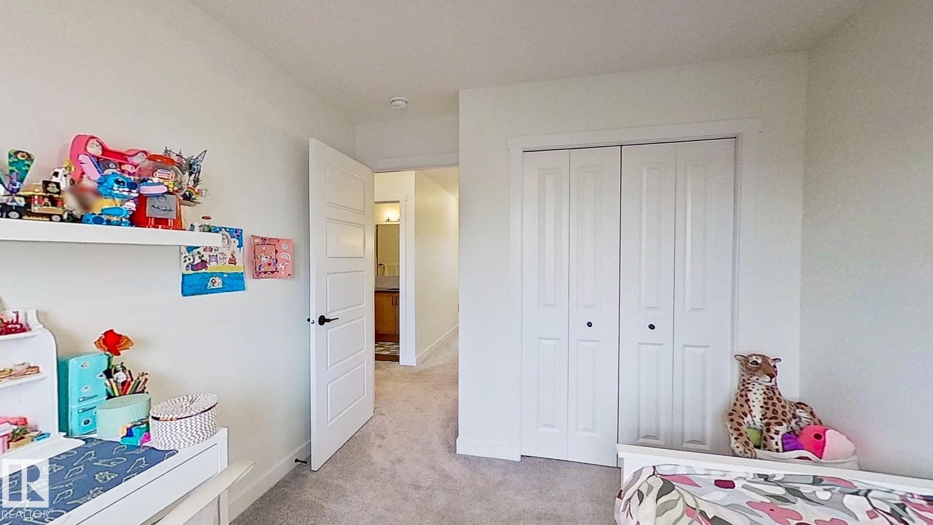 37 Emberside Link, Cochrane, AB - Indoor Photo Showing Bedroom