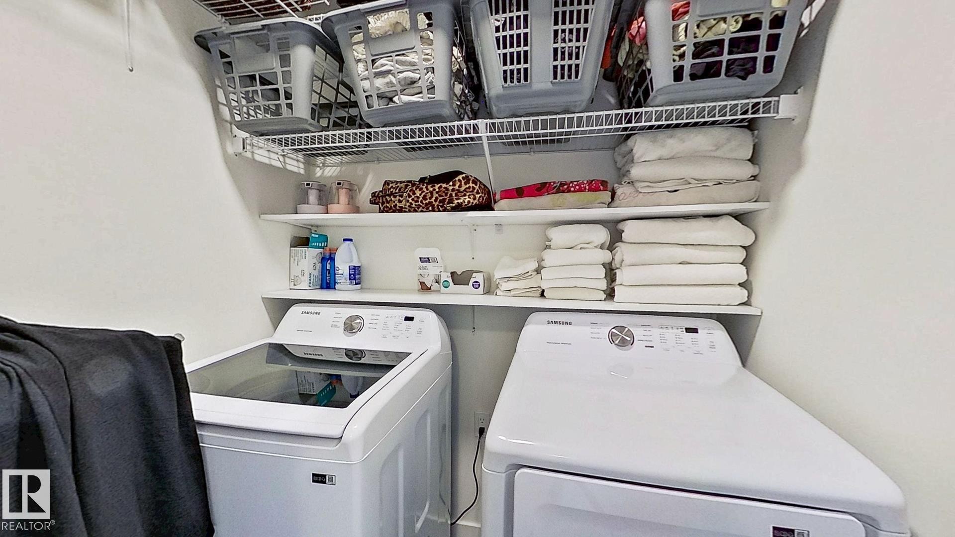 37 Emberside Link, Cochrane, AB - Indoor Photo Showing Laundry Room