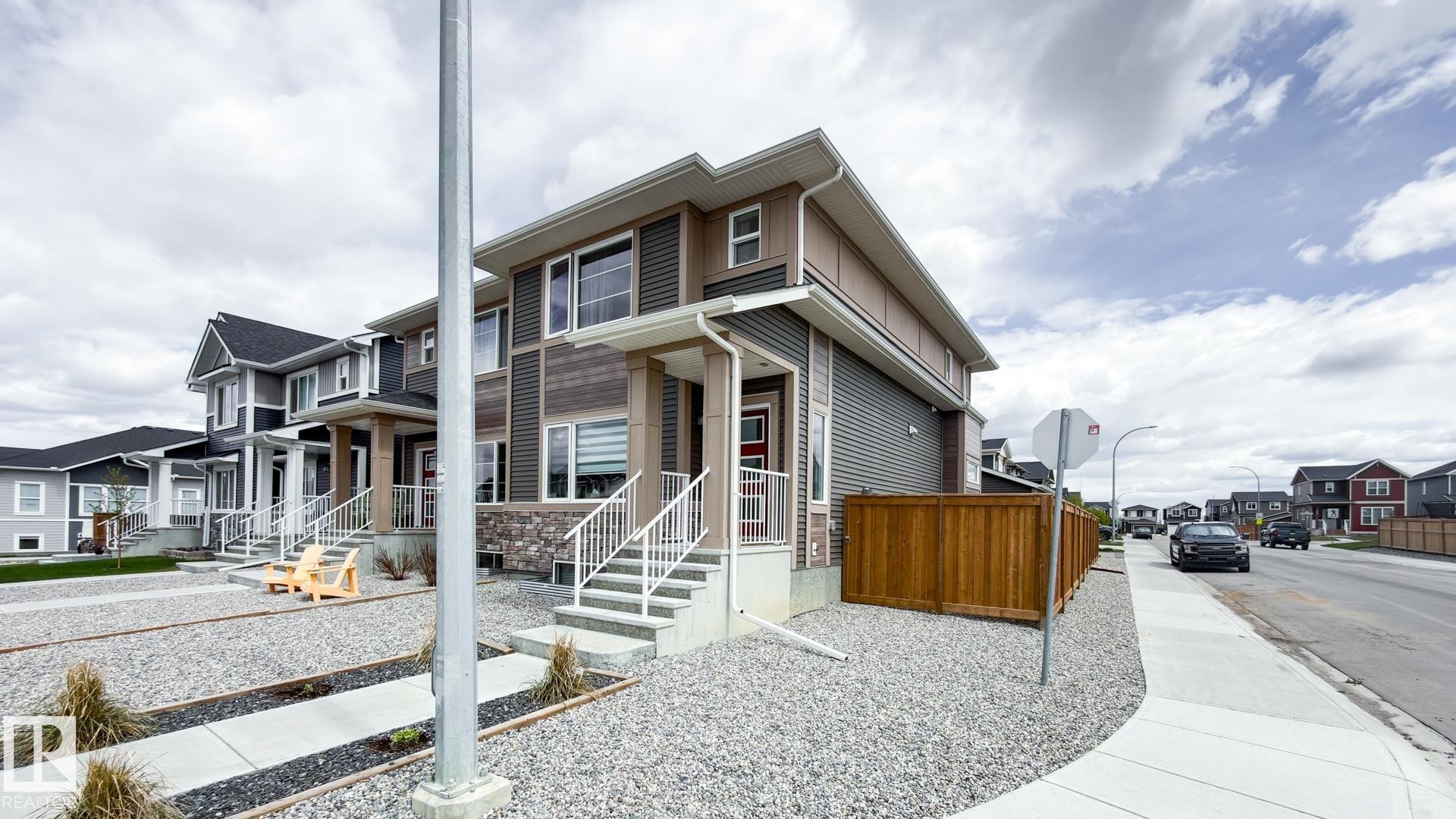 37 Emberside Link, Cochrane, AB - Outdoor With Facade
