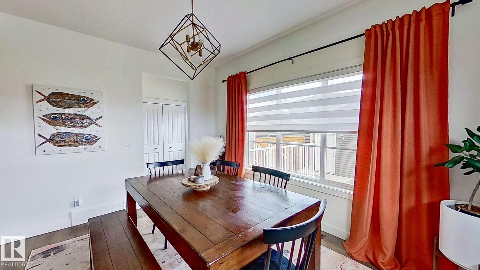 37 Emberside Link, Cochrane, AB - Indoor Photo Showing Dining Room