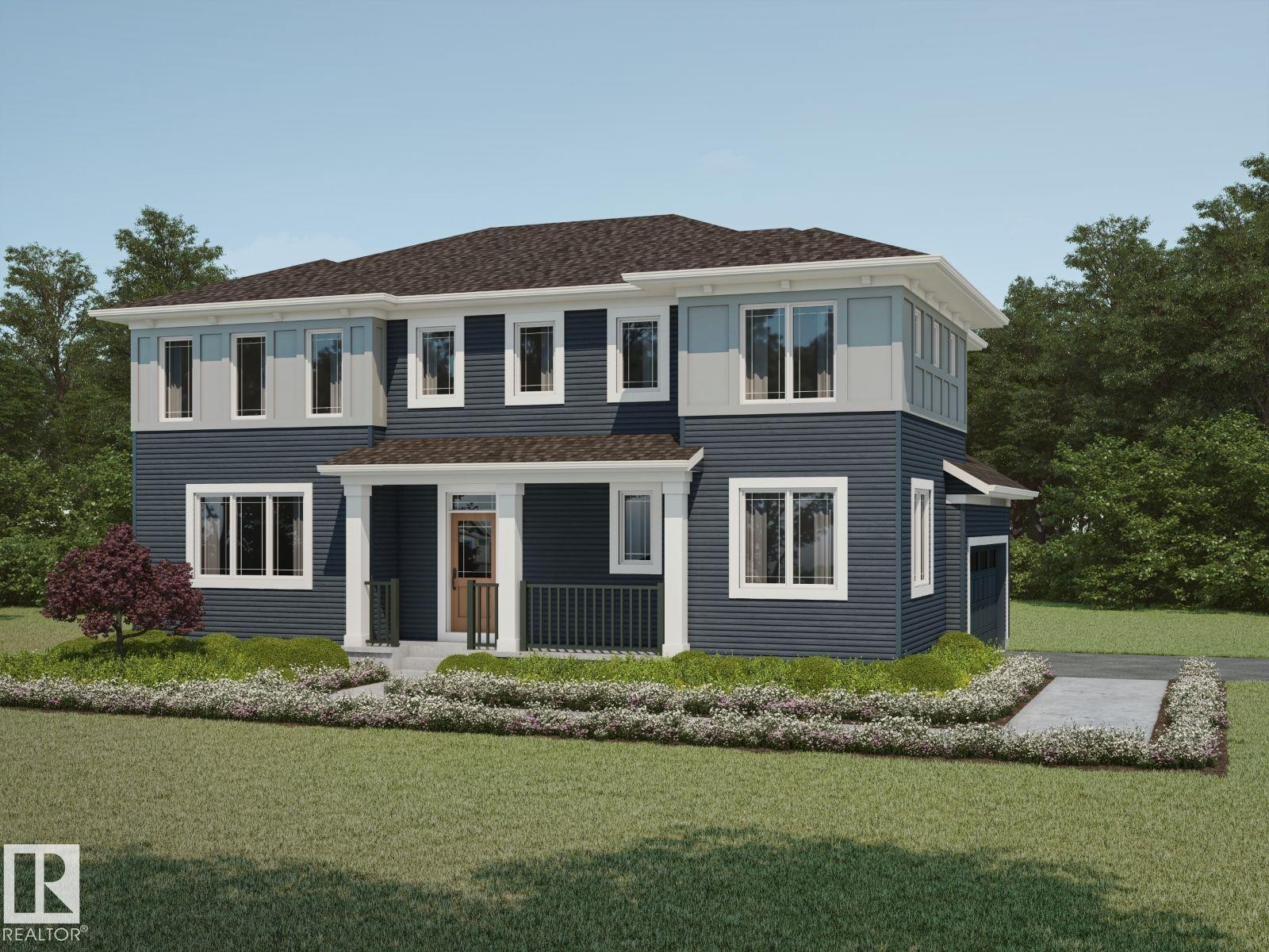 Two-story residence featuring a dark blue siding facade, white trim, and a covered porch with white columns - 20512 15 Avenue, Edmonton, AB - Outdoor With Facade