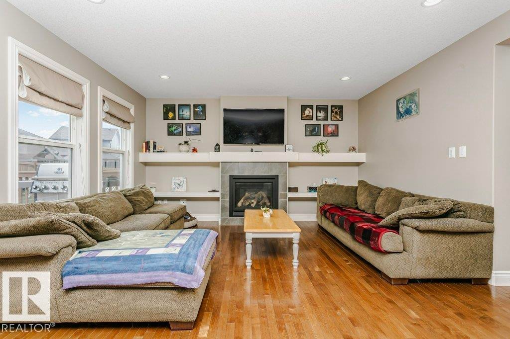 3339 21 Avenue, Edmonton, AB - Indoor Photo Showing Living Room With Fireplace