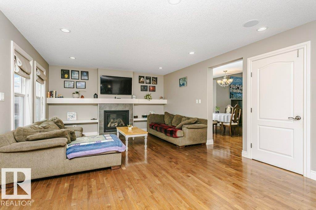 3339 21 Avenue, Edmonton, AB - Indoor Photo Showing Living Room With Fireplace