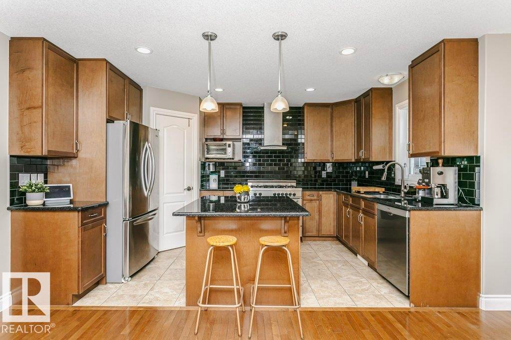 3339 21 Avenue, Edmonton, AB - Indoor Photo Showing Kitchen With Double Sink