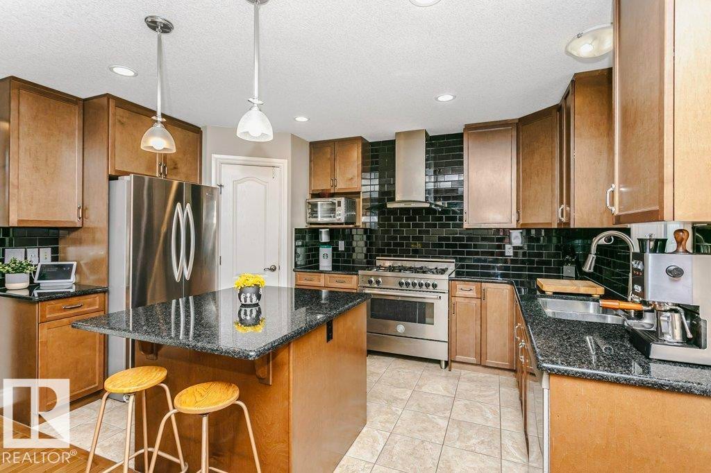 3339 21 Avenue, Edmonton, AB - Indoor Photo Showing Kitchen With Double Sink