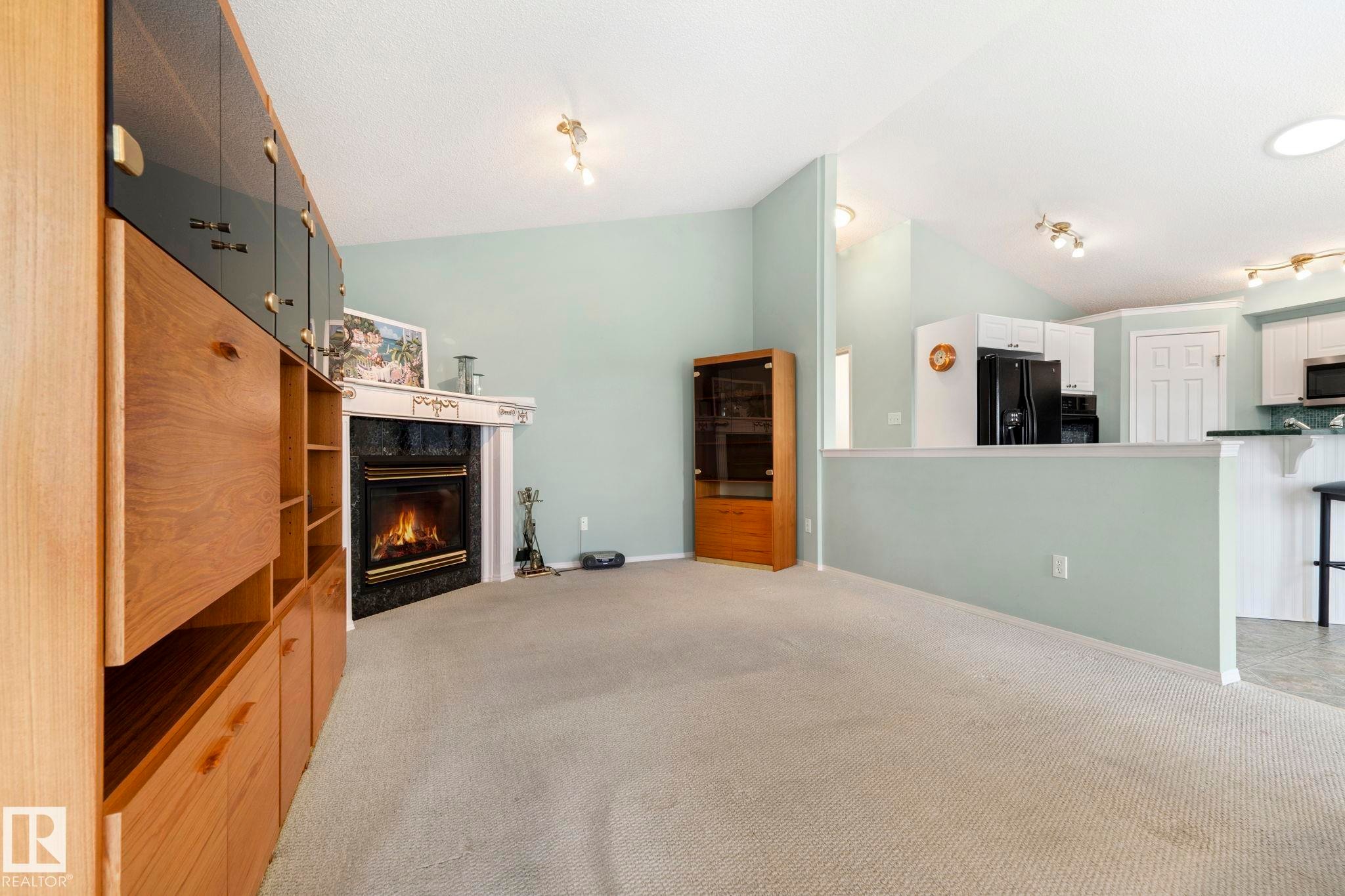 9315 162 Avenue Nw, Edmonton, AB - Indoor With Fireplace