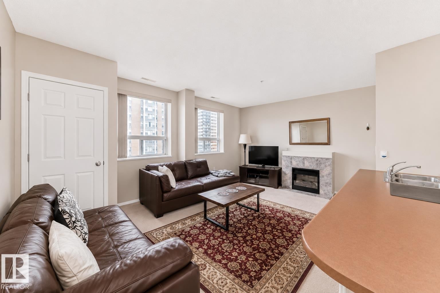 601 9919 105 Street, Edmonton, AB - Indoor Photo Showing Living Room With Fireplace