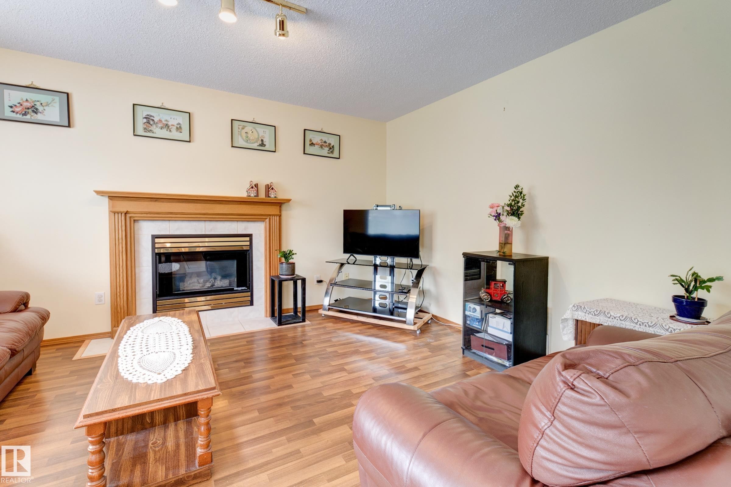 1003 Blackburn Close, Edmonton, AB - Indoor Photo Showing Living Room With Fireplace