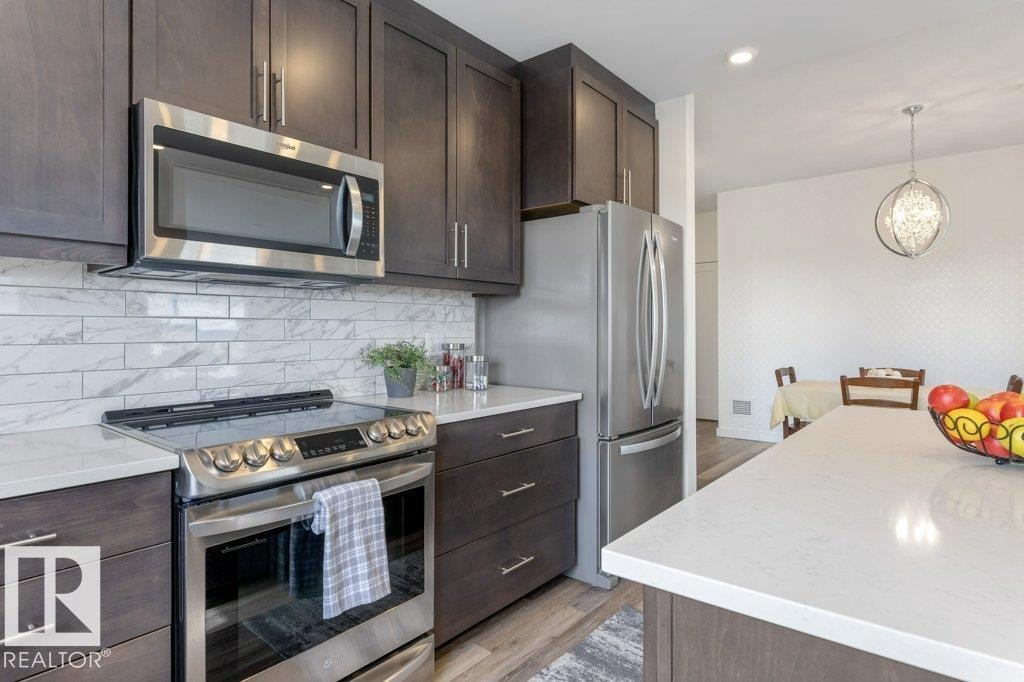 430 5504 Schonsee Drive, Edmonton, AB - Indoor Photo Showing Kitchen With Stainless Steel Kitchen With Upgraded Kitchen