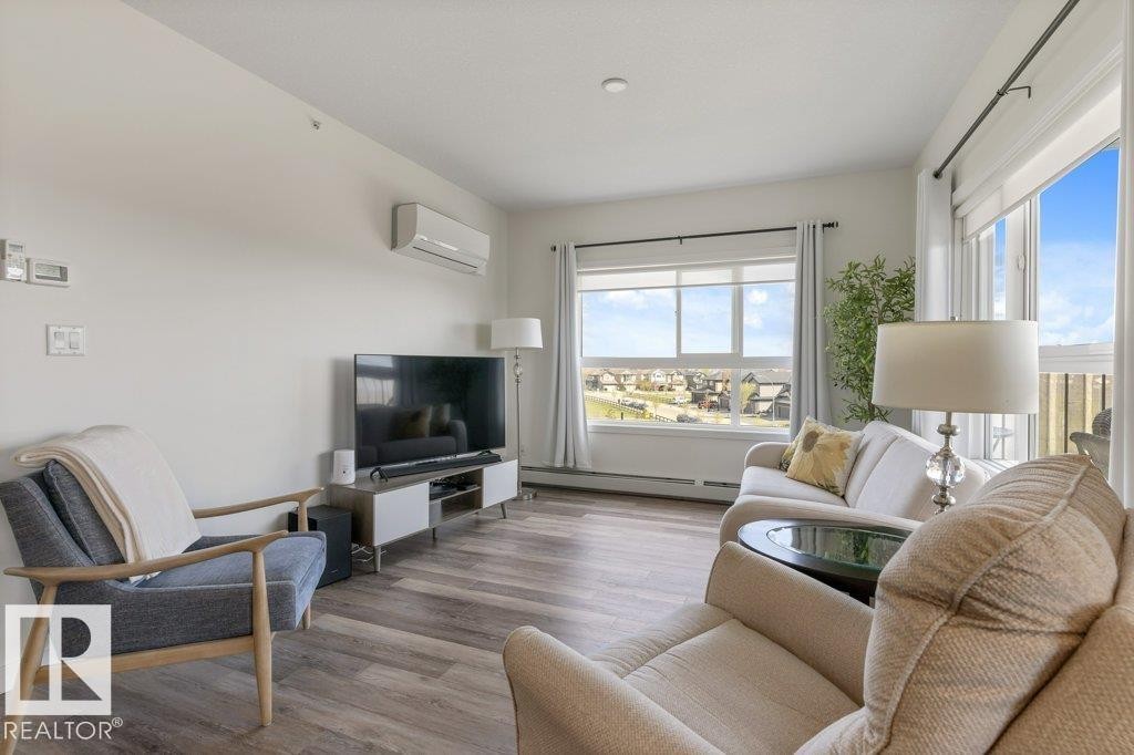 430 5504 Schonsee Drive, Edmonton, AB - Indoor Photo Showing Living Room