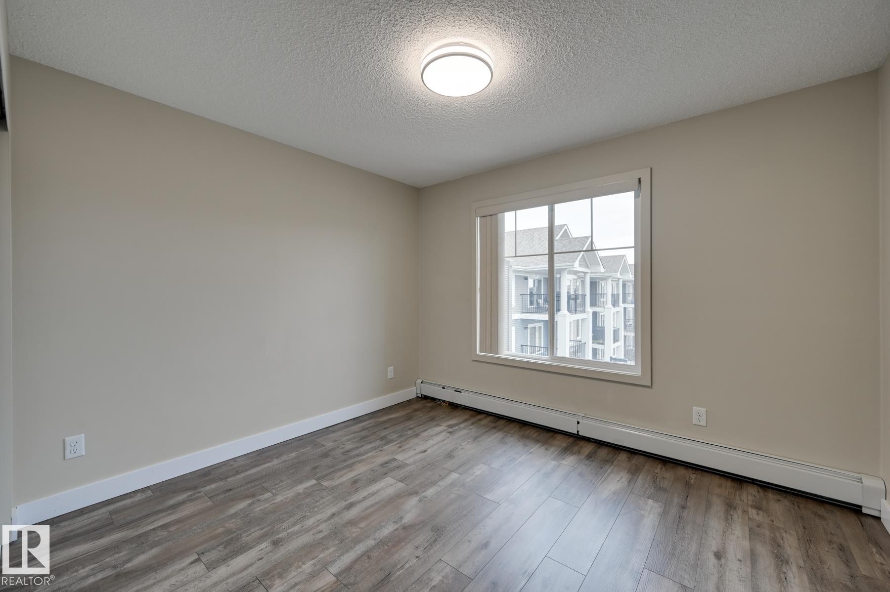 408 6084 Stanton Drive, Edmonton, AB - Indoor Photo Showing Other Room