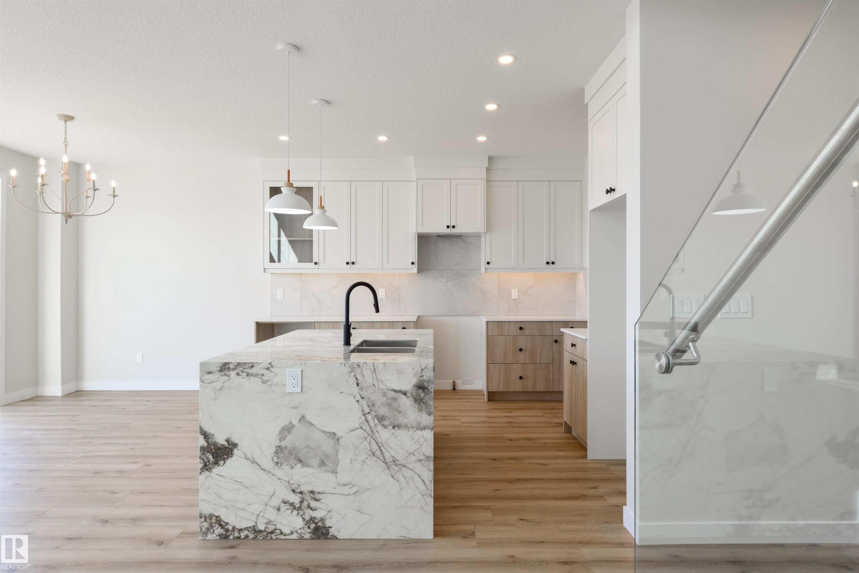 1443 Osprey Crest Nw, Edmonton, AB - Indoor Photo Showing Kitchen With Double Sink