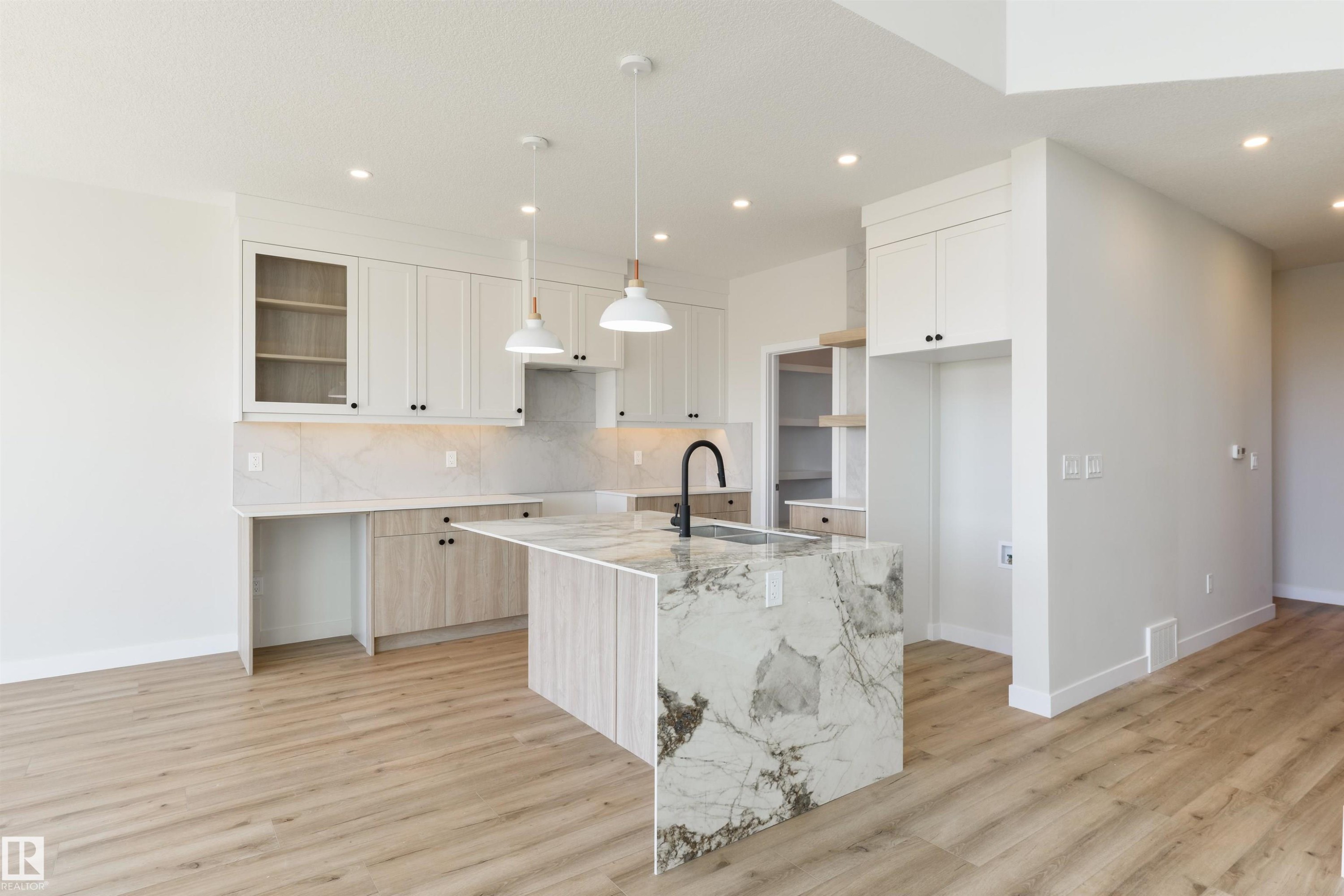1443 Osprey Crest Nw, Edmonton, AB - Indoor Photo Showing Kitchen With Upgraded Kitchen