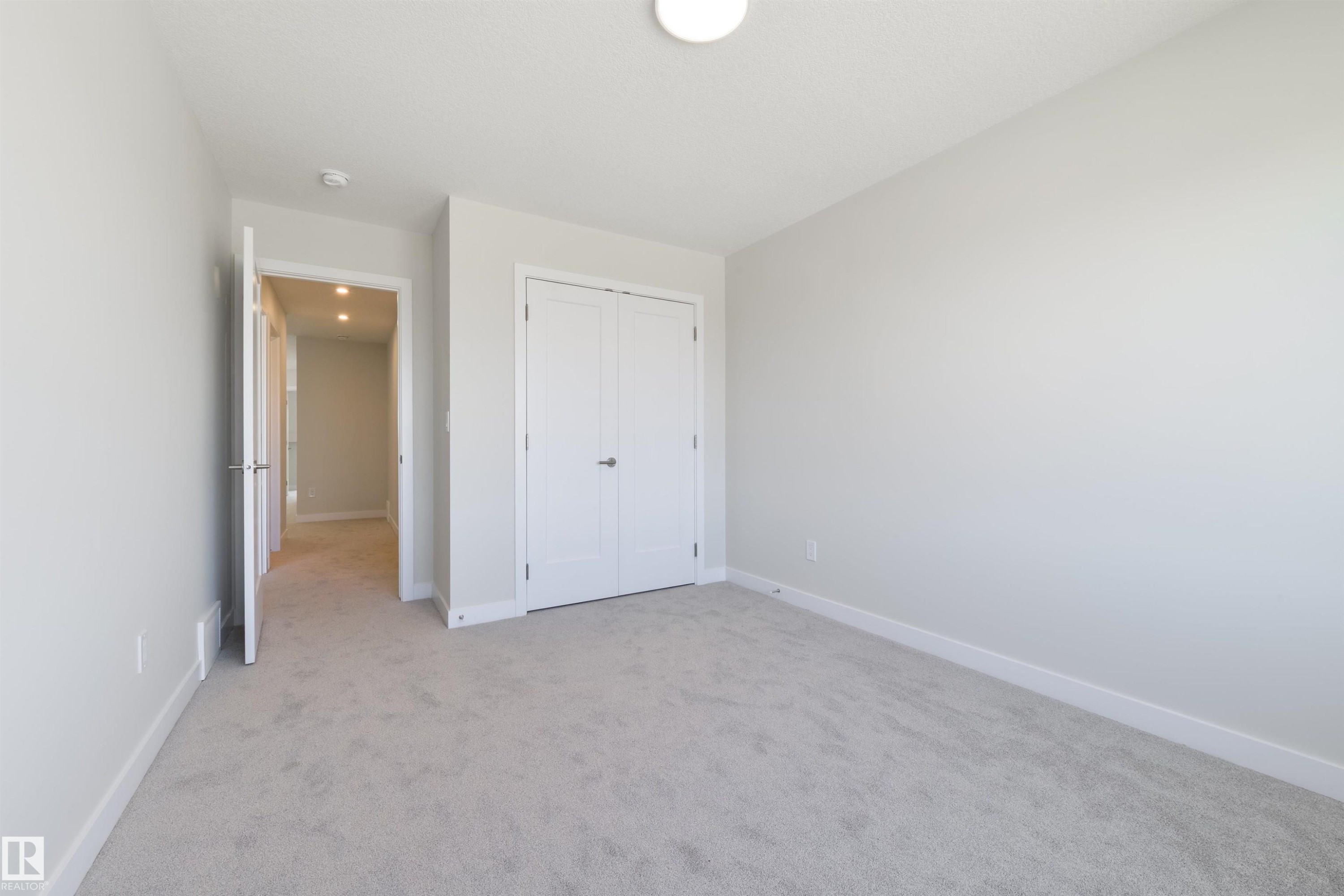 1443 Osprey Crest Nw, Edmonton, AB - Indoor Photo Showing Other Room