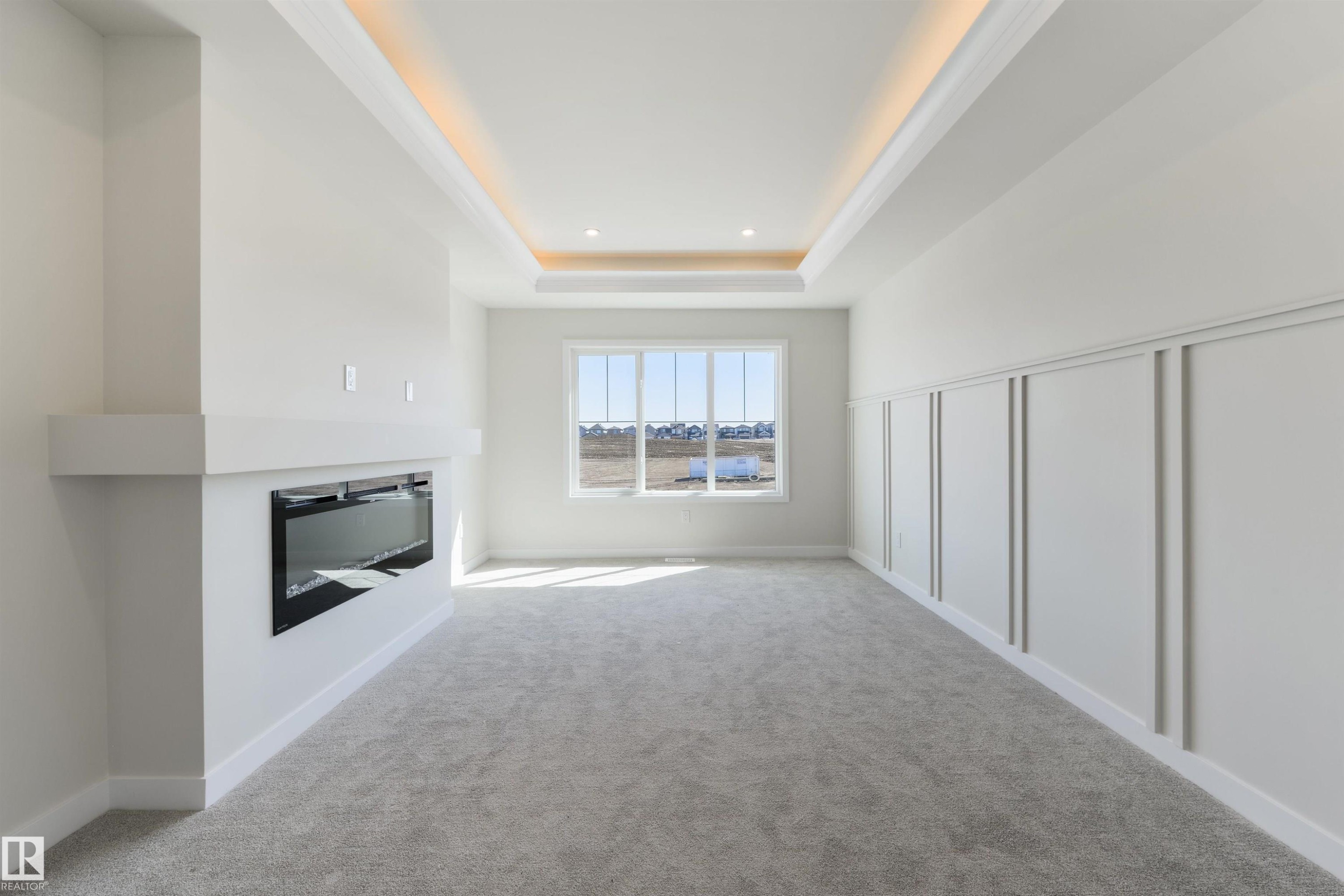 1443 Osprey Crest Nw, Edmonton, AB - Indoor Photo Showing Other Room With Fireplace