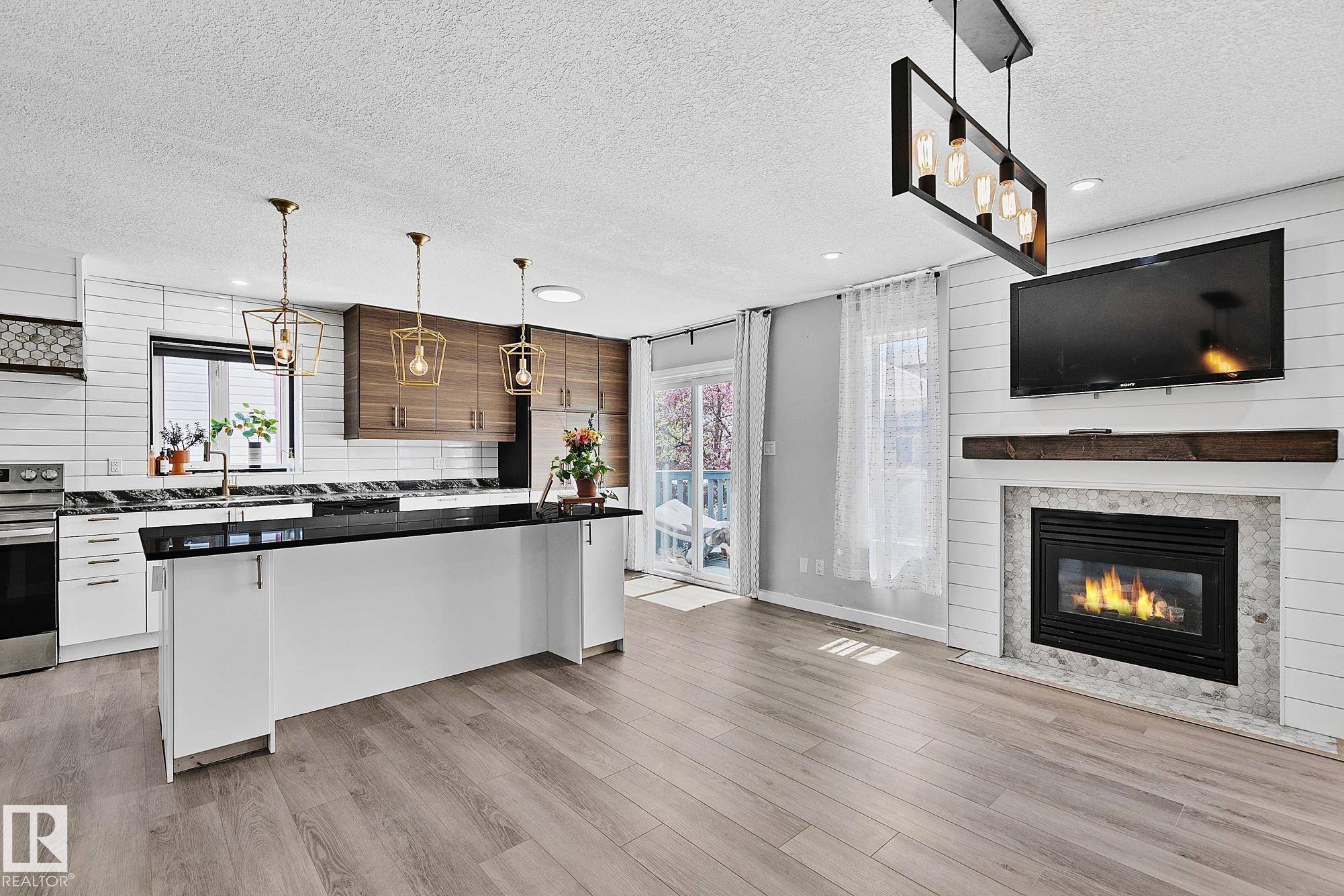 3205 41A Avenue, Edmonton, AB - Indoor Photo Showing Other Room With Fireplace