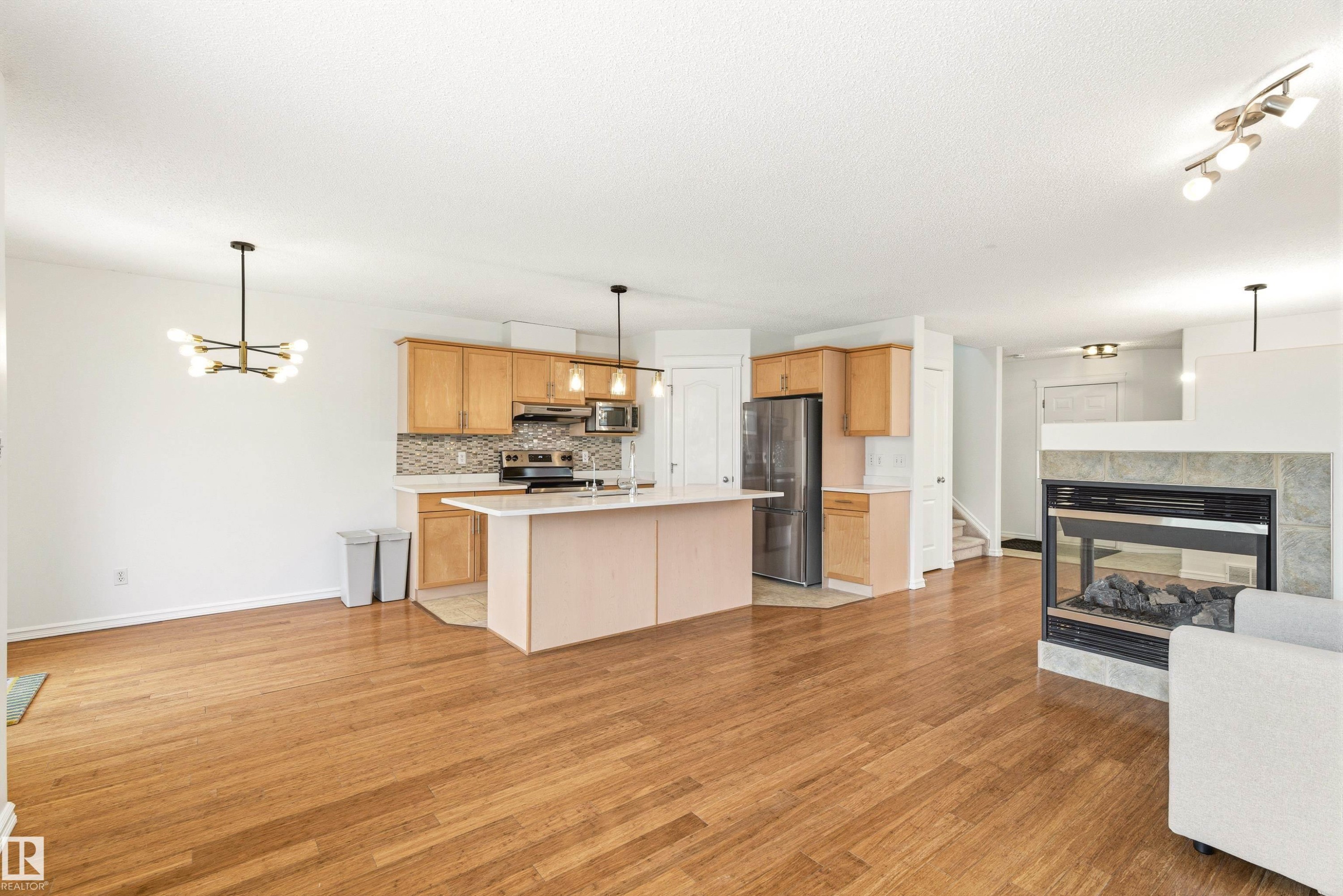 2550 Rabbit Hill Road, Edmonton, AB - Indoor Photo Showing Other Room With Fireplace