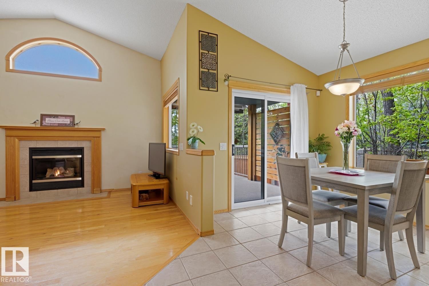 70 Eastcott Drive, St. Albert, AB - Indoor Photo Showing Dining Room With Fireplace