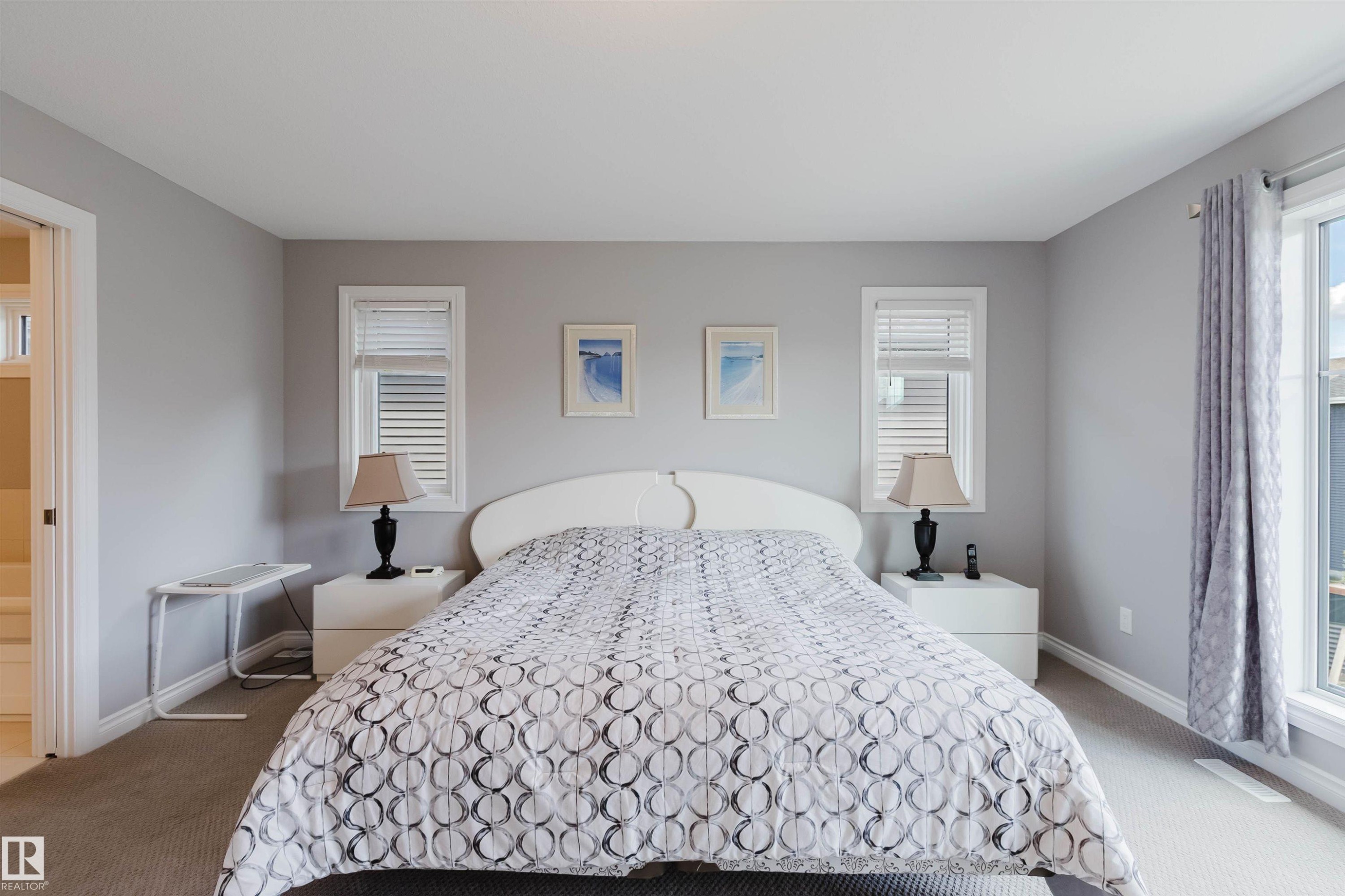 Bedroom featuring light gray walls, carpet flooring, and white trim - 3571 Keswick Boulevard, Edmonton, AB - Indoor Photo Showing Bedroom