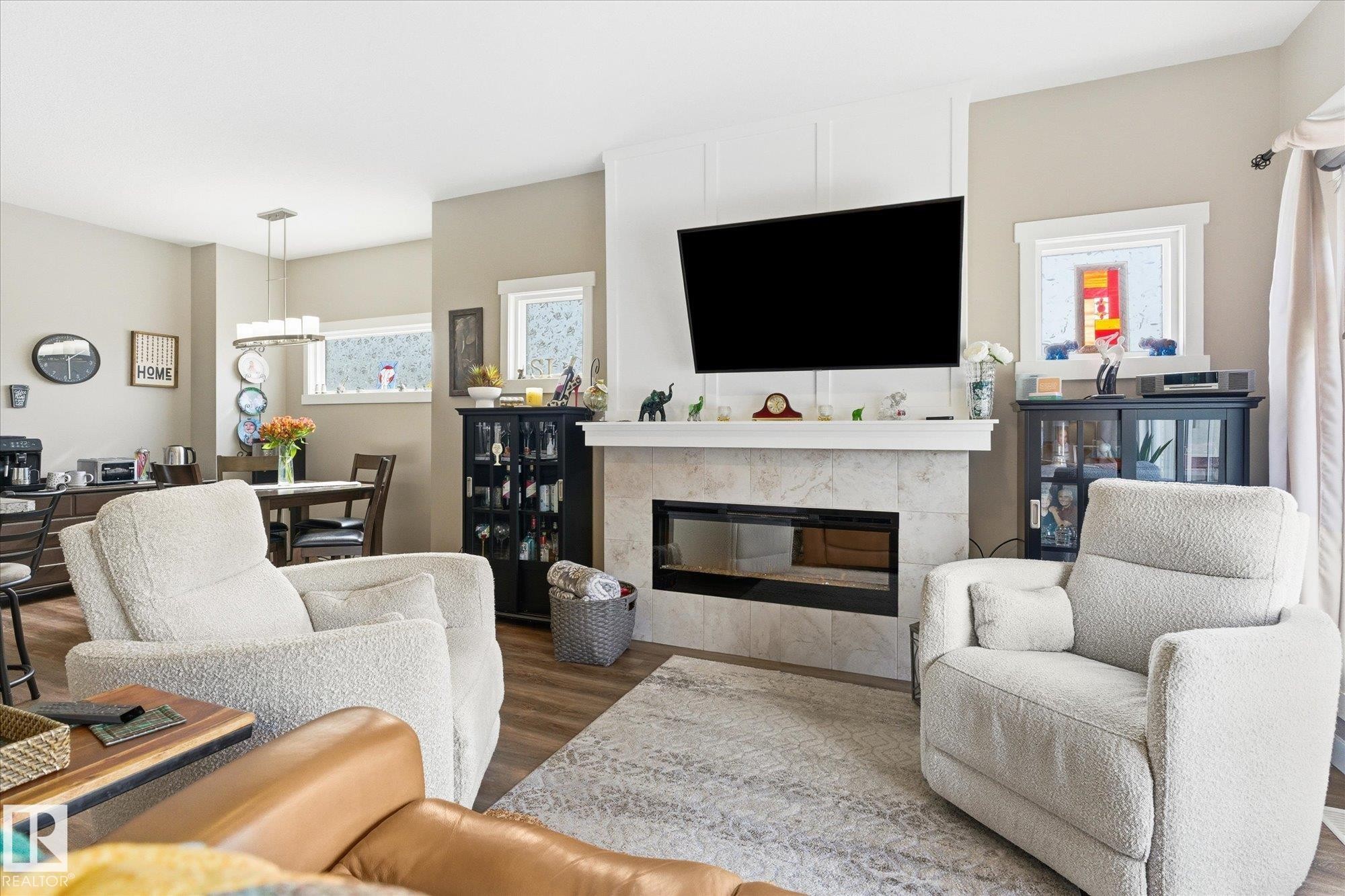 34 Brickyard Drive, Stony Plain, AB - Indoor Photo Showing Living Room With Fireplace