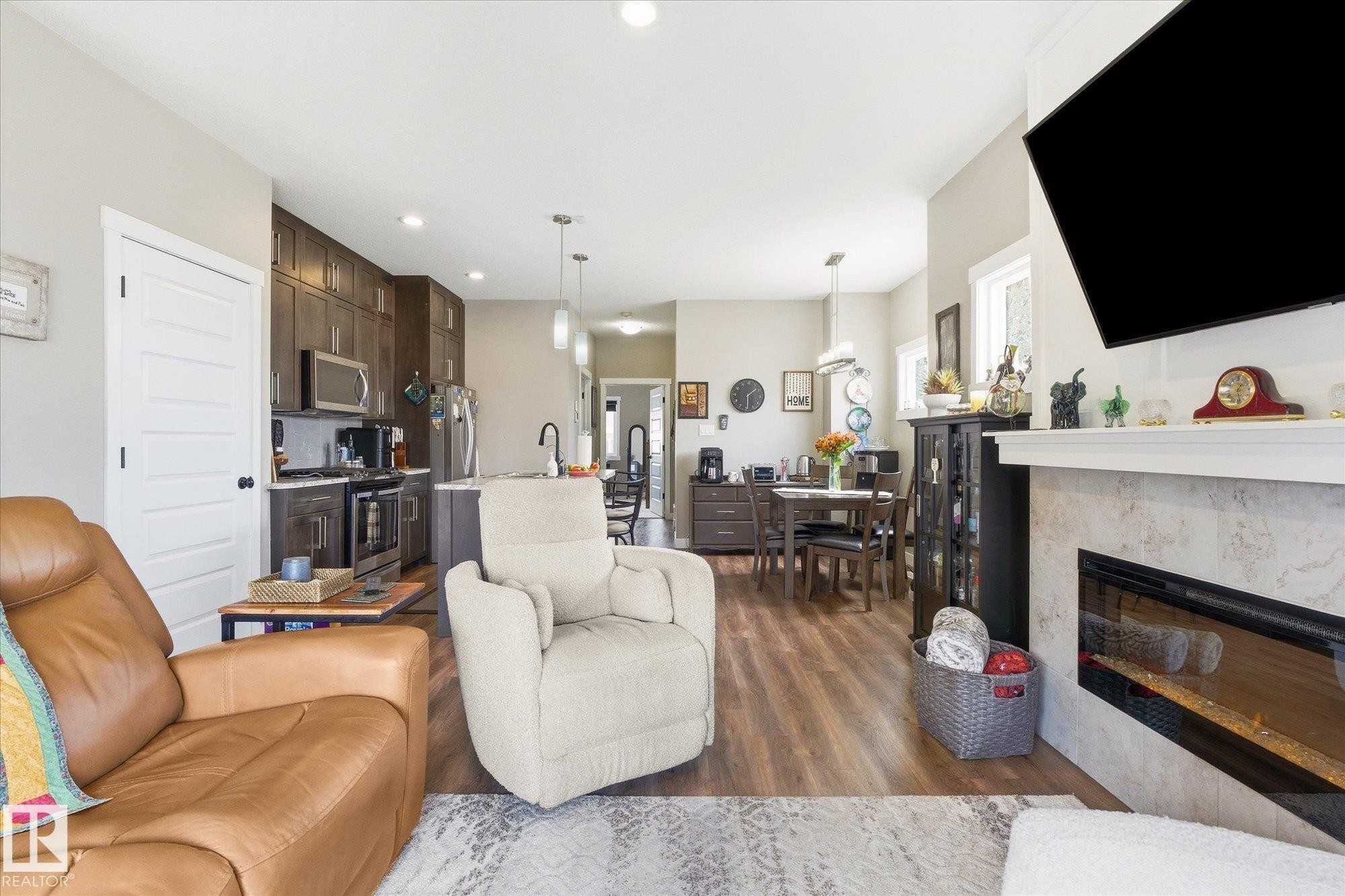 34 Brickyard Drive, Stony Plain, AB - Indoor Photo Showing Living Room With Fireplace