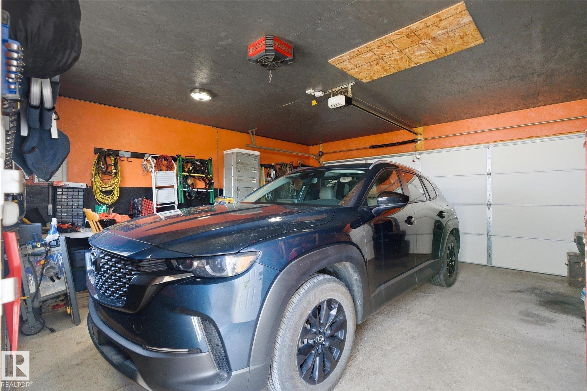 34 Brickyard Drive, Stony Plain, AB - Indoor Photo Showing Garage