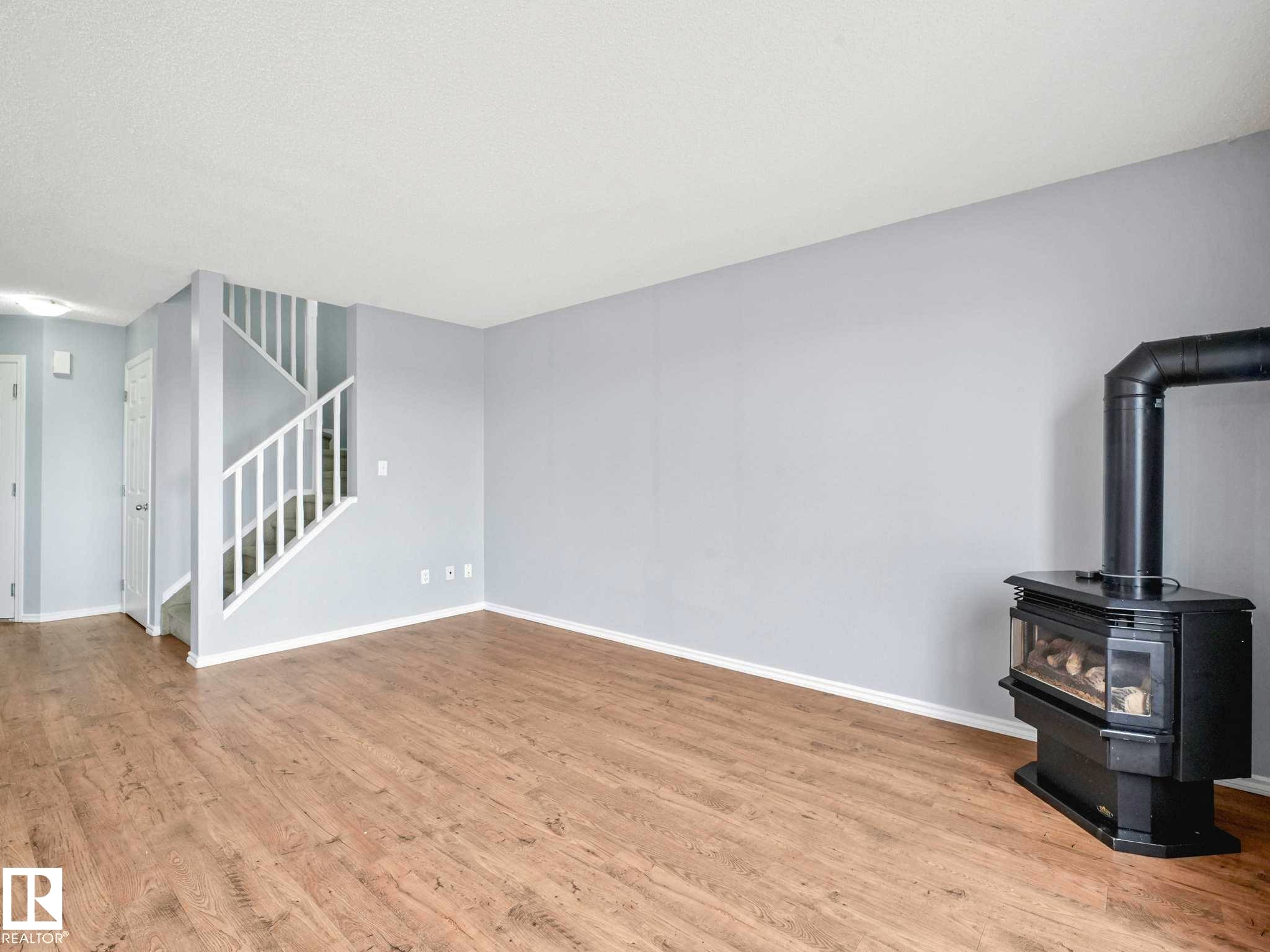 6424 1A Avenue, Edmonton, AB - Indoor Photo Showing Other Room With Fireplace
