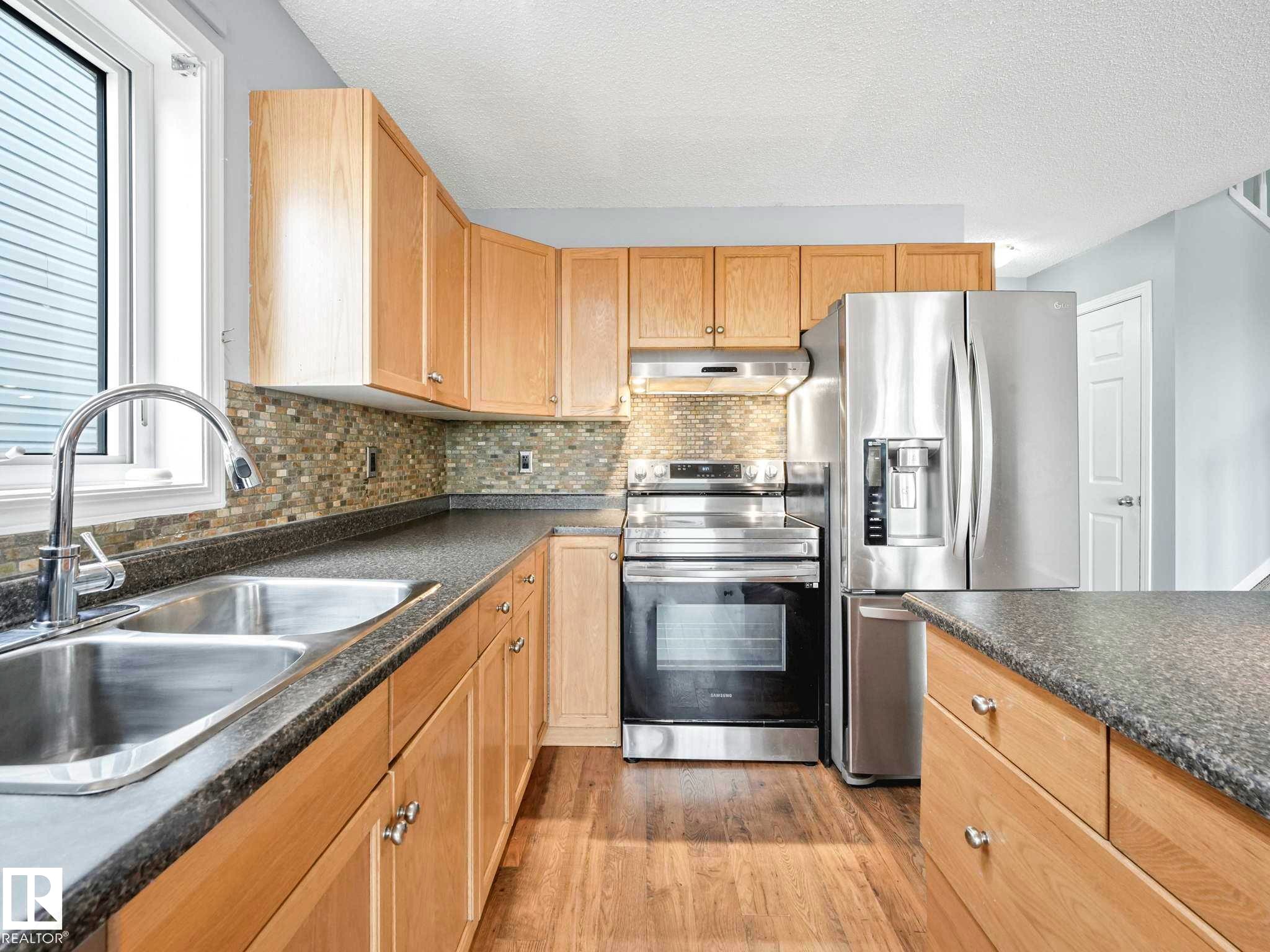 6424 1A Avenue, Edmonton, AB - Indoor Photo Showing Kitchen With Stainless Steel Kitchen With Double Sink