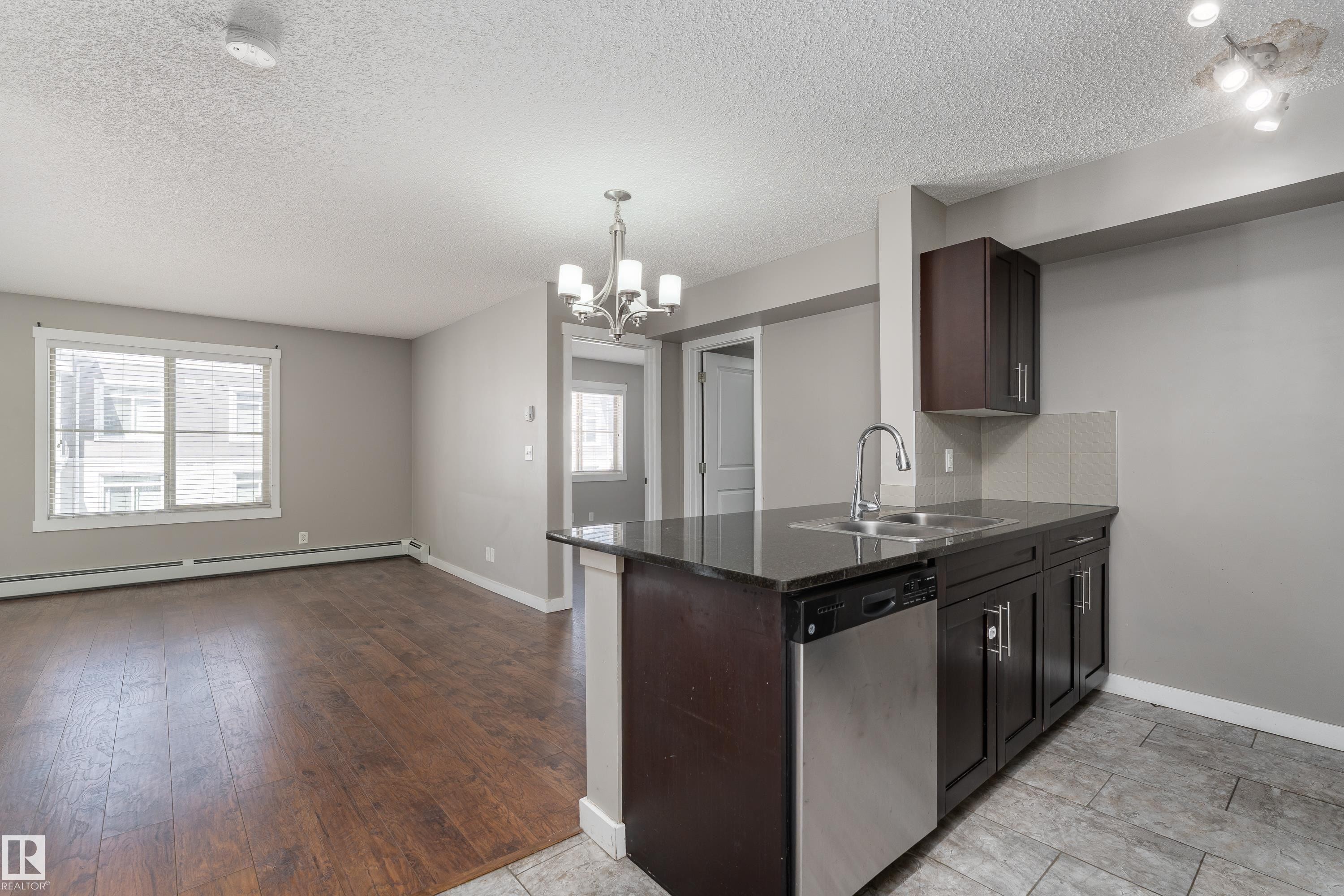 409 5804 Mullen Place, Edmonton, AB - Indoor Photo Showing Kitchen