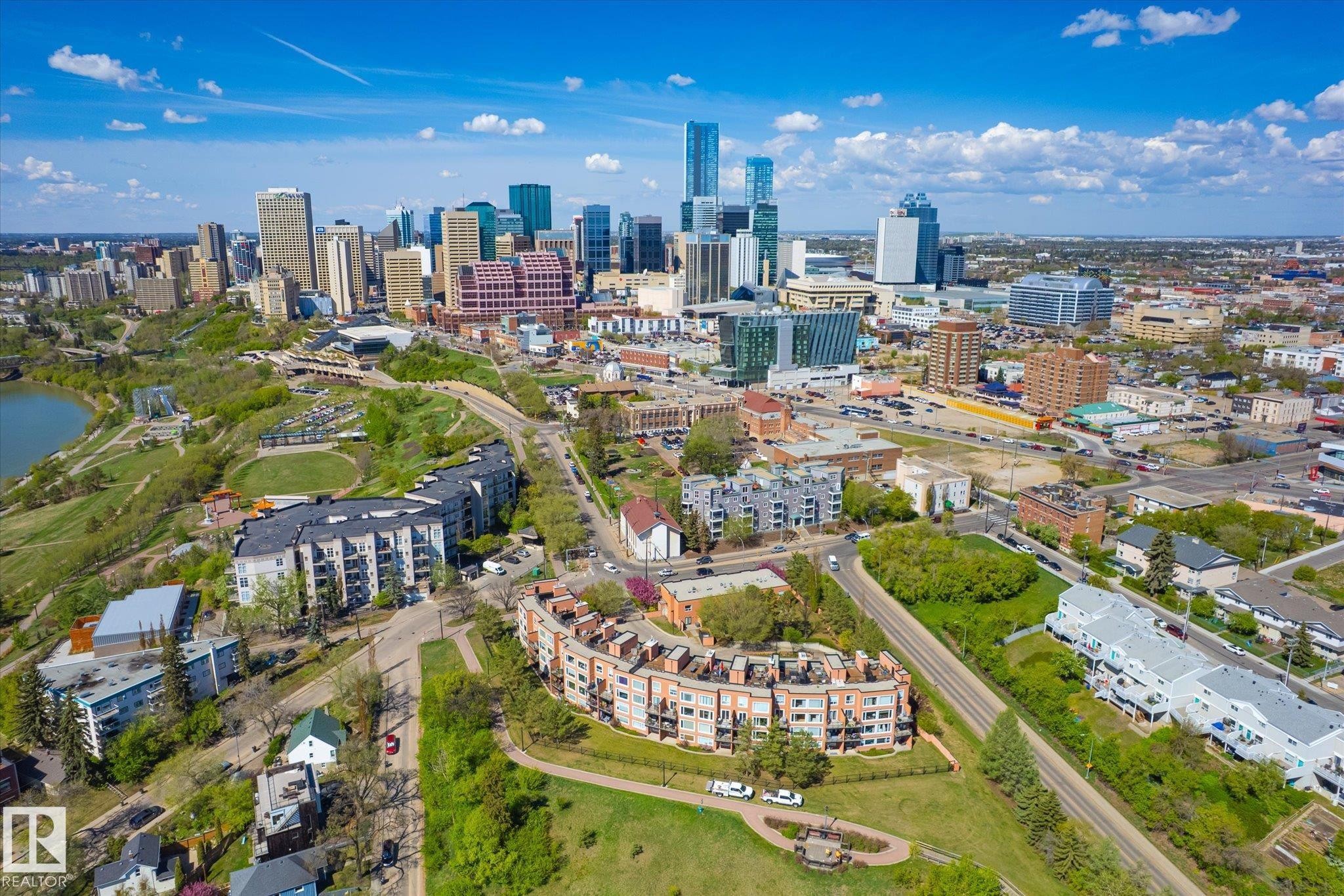 Expansive aerial perspective showcasing a vibrant cityscape with a prominent river and surrounding green spaces - 108 10105 95 Street, Edmonton, AB - Outdoor With View