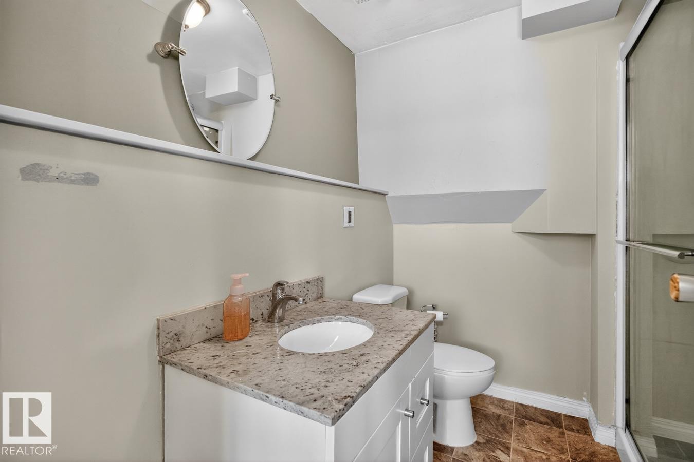 3 Piece Bathroom featuring shower and vanity with ample storage. - 18655 61 Avenue, Edmonton, AB - Indoor Photo Showing Bathroom