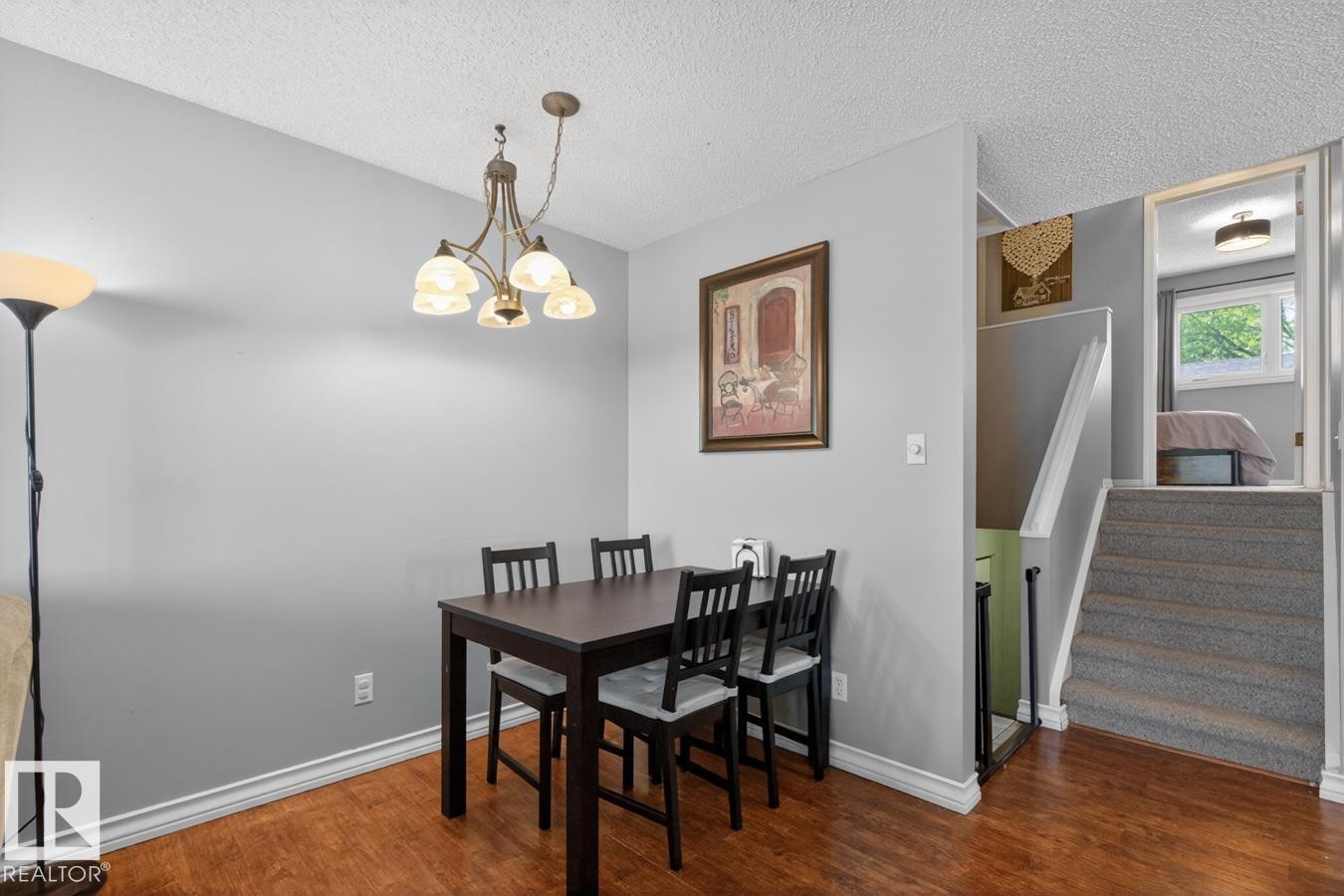 Open Concept Dining Room with easy access to Living Room and Kitchen. - 18655 61 Avenue, Edmonton, AB - Indoor Photo Showing Dining Room
